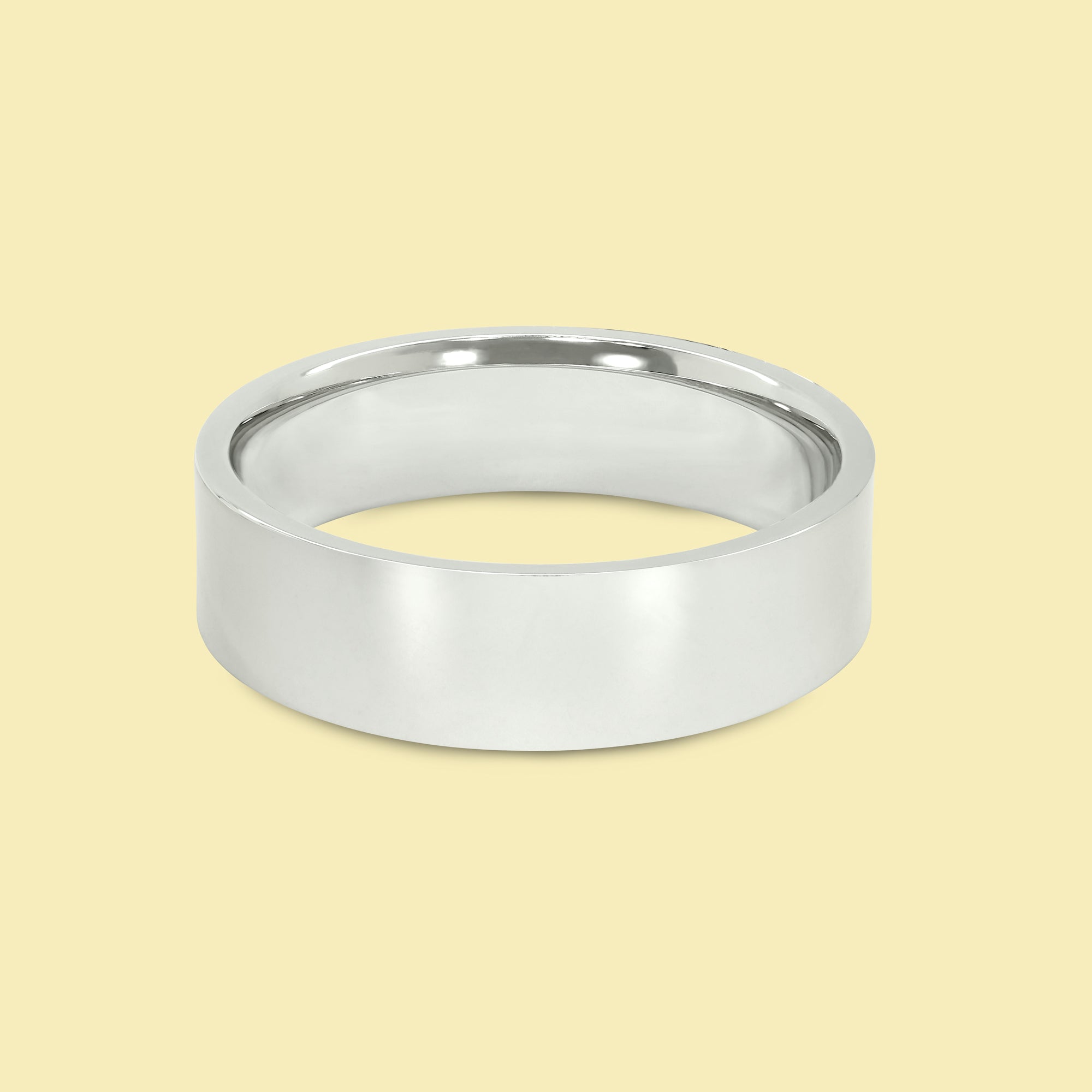 The Quinn Solid Gold 6mm Flat-Top Straight Edge Ultra Slim Profile High Polish Men's Wedding Band in 14K Gold, 18K Gold, or Platinum by Earthena Jewelry of Beverly Hills.