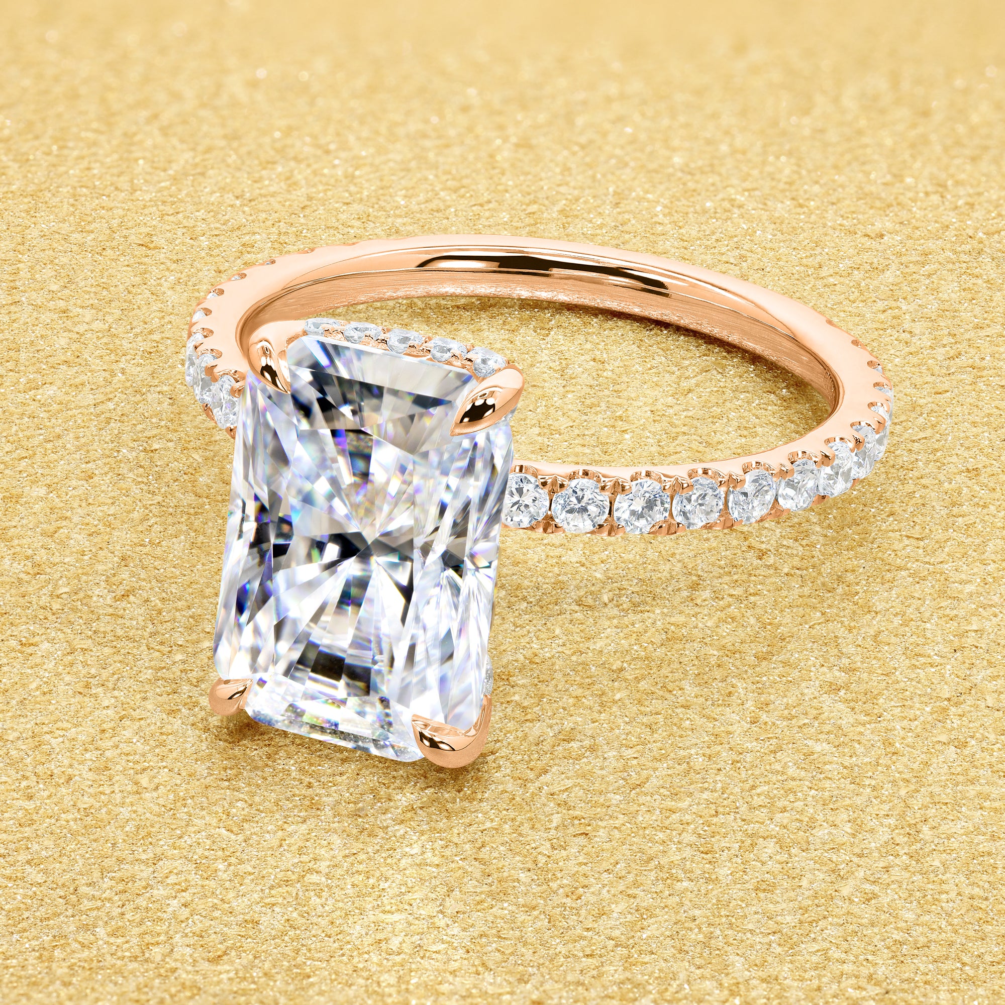 Classic Selina 3ct Elongated Radiant-cut Moissanite Hidden Vow Halo Lab-grown Diamond Engagement ring in 14K gold, 18K gold, or Platinum by Earthena Jewelry of Beverly Hills.