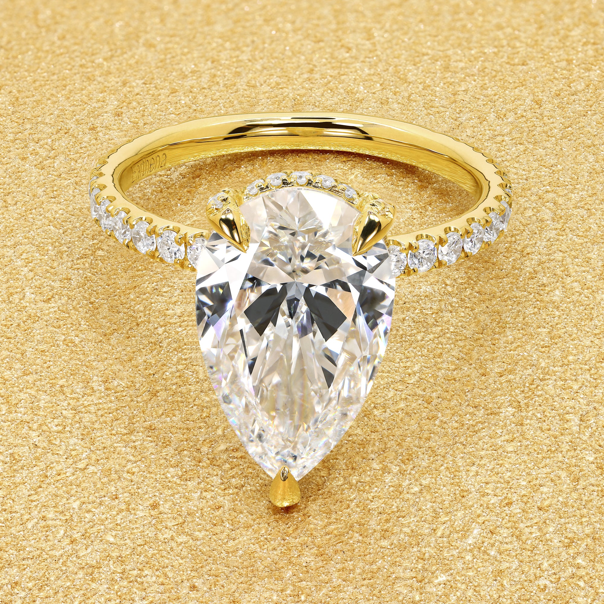 Classic Selina 3.3ct Elongated Pear-cut Lab-grown Diamond Hidden Wrap Halo Engagement ring in 18K Yellow Gold by Earthena Jewelry of Beverly Hills.