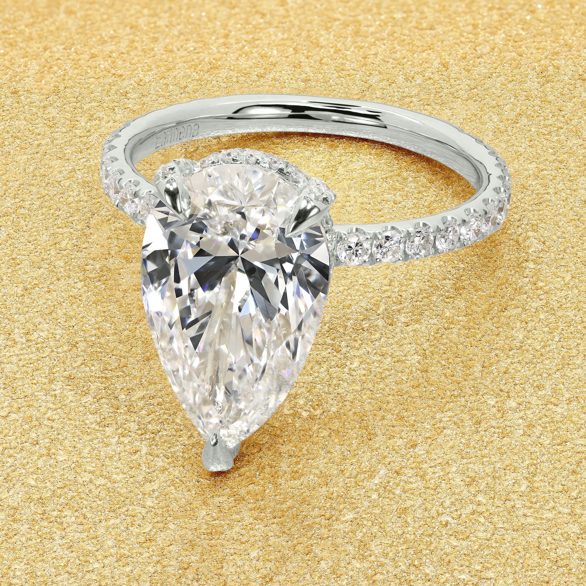 Classic Selina 3.3ct Elongated Pear-cut Lab-grown Diamond Hidden Wrap Halo Engagement ring in 14K gold, 18K gold, or Platinum by Earthena Jewelry of Beverly Hills.