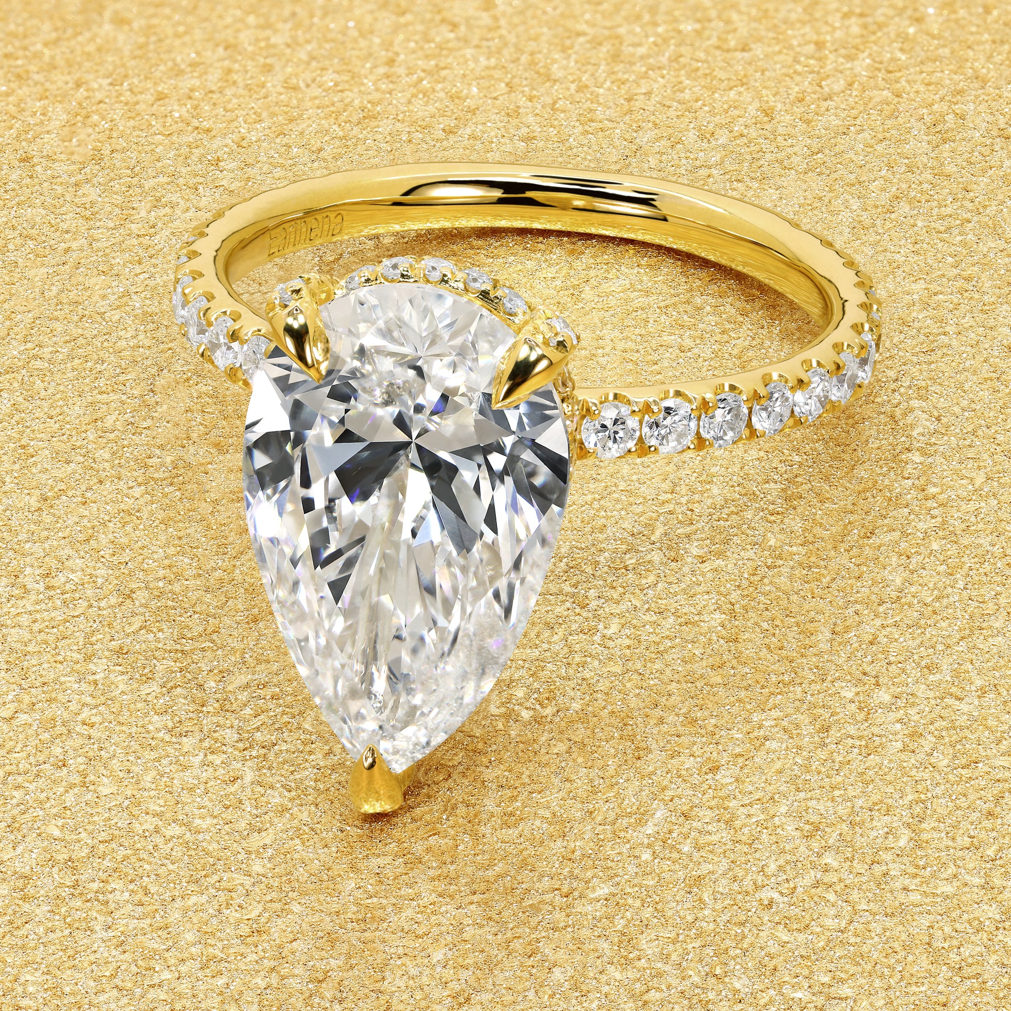 Classic Selina 3.3ct Elongated Pear-cut Lab-grown Diamond Hidden Wrap Halo Engagement ring in 14K gold, 18K gold, or Platinum by Earthena Jewelry of Beverly Hills.