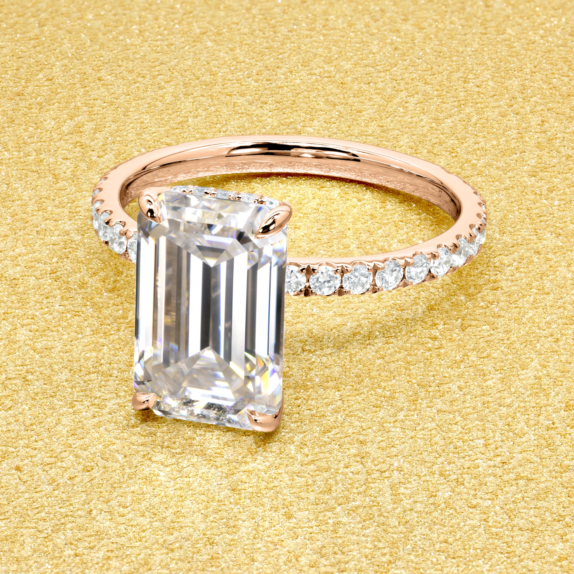 Selina 3.5ct Elongated Emerald-Cut Moissanite Hidden Vow Halo Engagement Ring crafted in 14K gold, 18K gold, or Platinum by Earthena Jewelry of Beverly Hills.