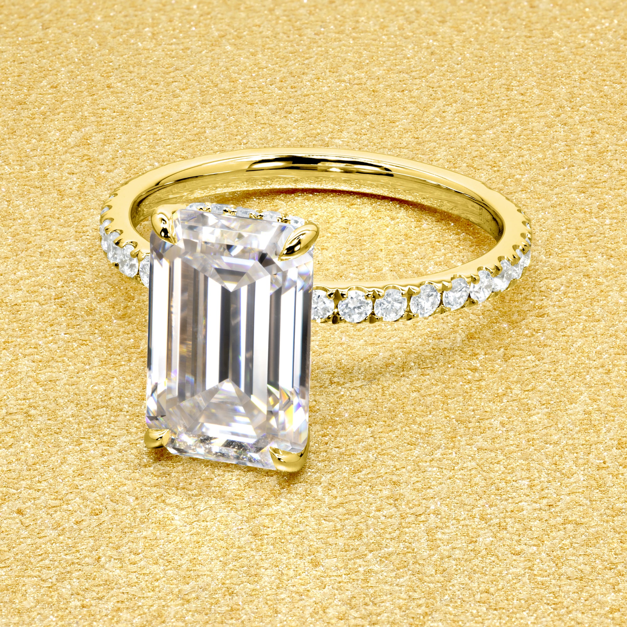 Selina 3.5ct Elongated Emerald-Cut Moissanite Hidden Vow Halo Engagement Ring crafted in 14K gold, 18K gold, or Platinum by Earthena Jewelry of Beverly Hills.