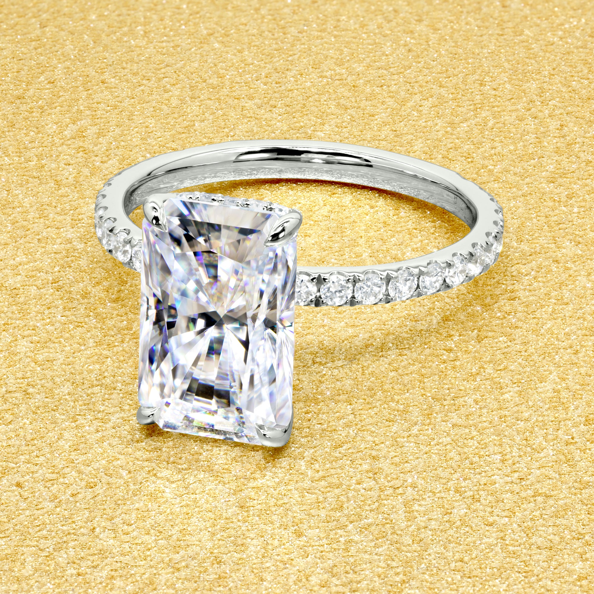 Selina 3.5ct Elongated Radiant-Cut Moissanite Hidden Vow Halo Engagement Ring crafted in 14K gold, 18K gold, or Platinum by Earthena Jewelry of Beverly Hills.