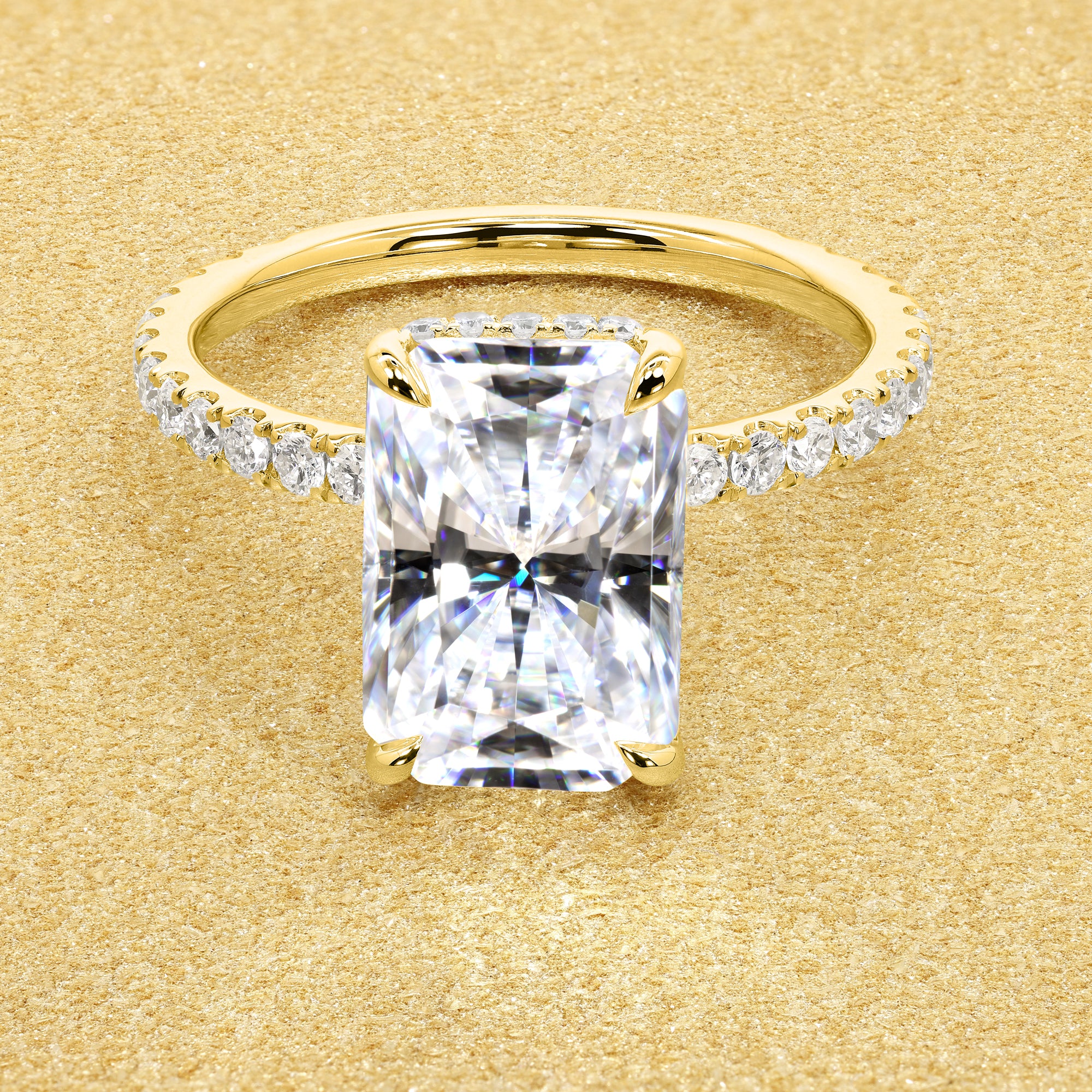 Classic Selina 3ct Elongated Radiant-cut Moissanite Hidden Vow Halo Lab-grown Diamond Engagement ring in 14K gold, 18K gold, or Platinum by Earthena Jewelry of Beverly Hills.