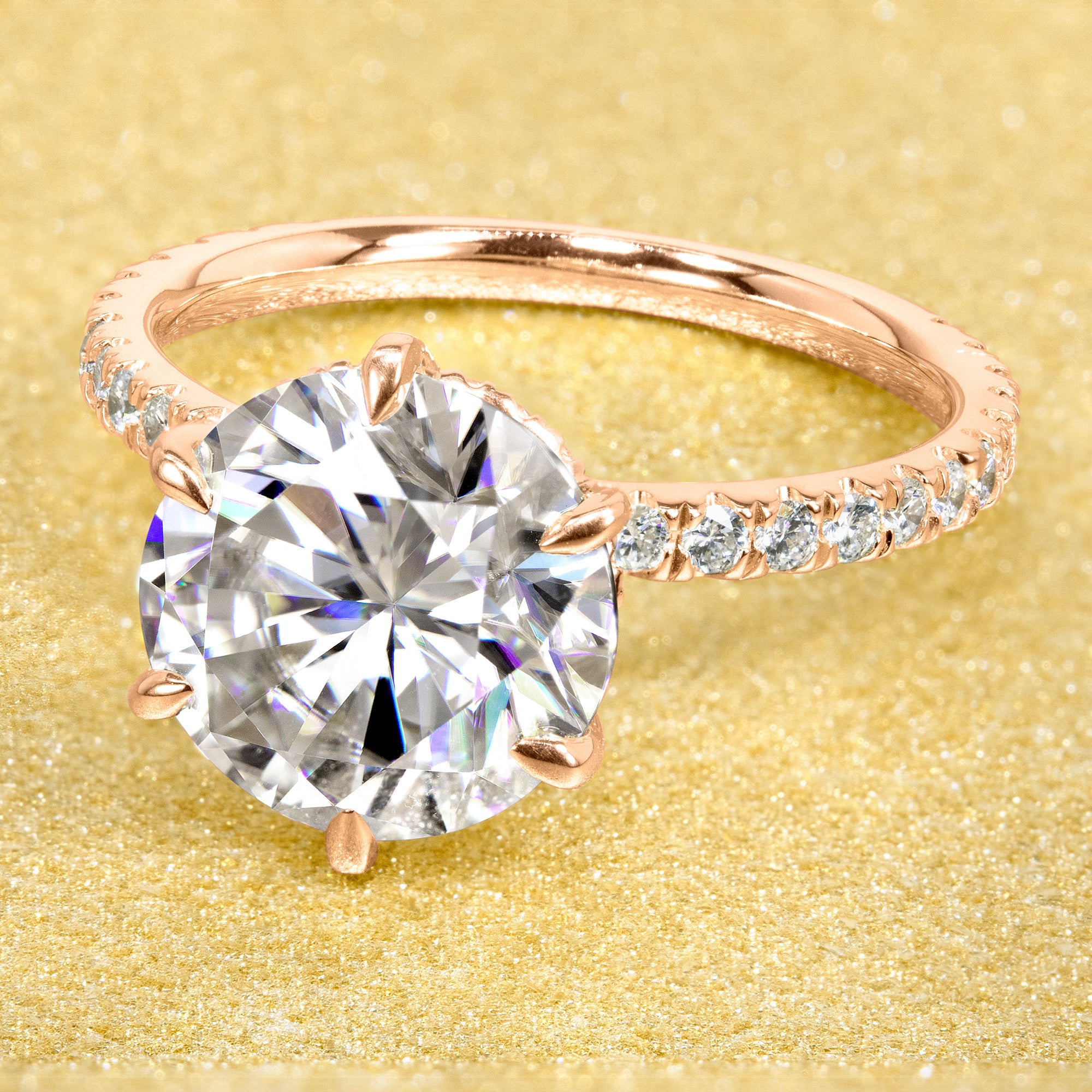 The Selina 3ct Round Brilliant-cut Hidden Eternity Halo Moissanite Engagement Ring, a classic look with an elegant twist complemented by Lab Diamonds handcrafted in 14K gold, 18K gold or Platinum handcrafted in Los Angeles by Earthena Jewelry.