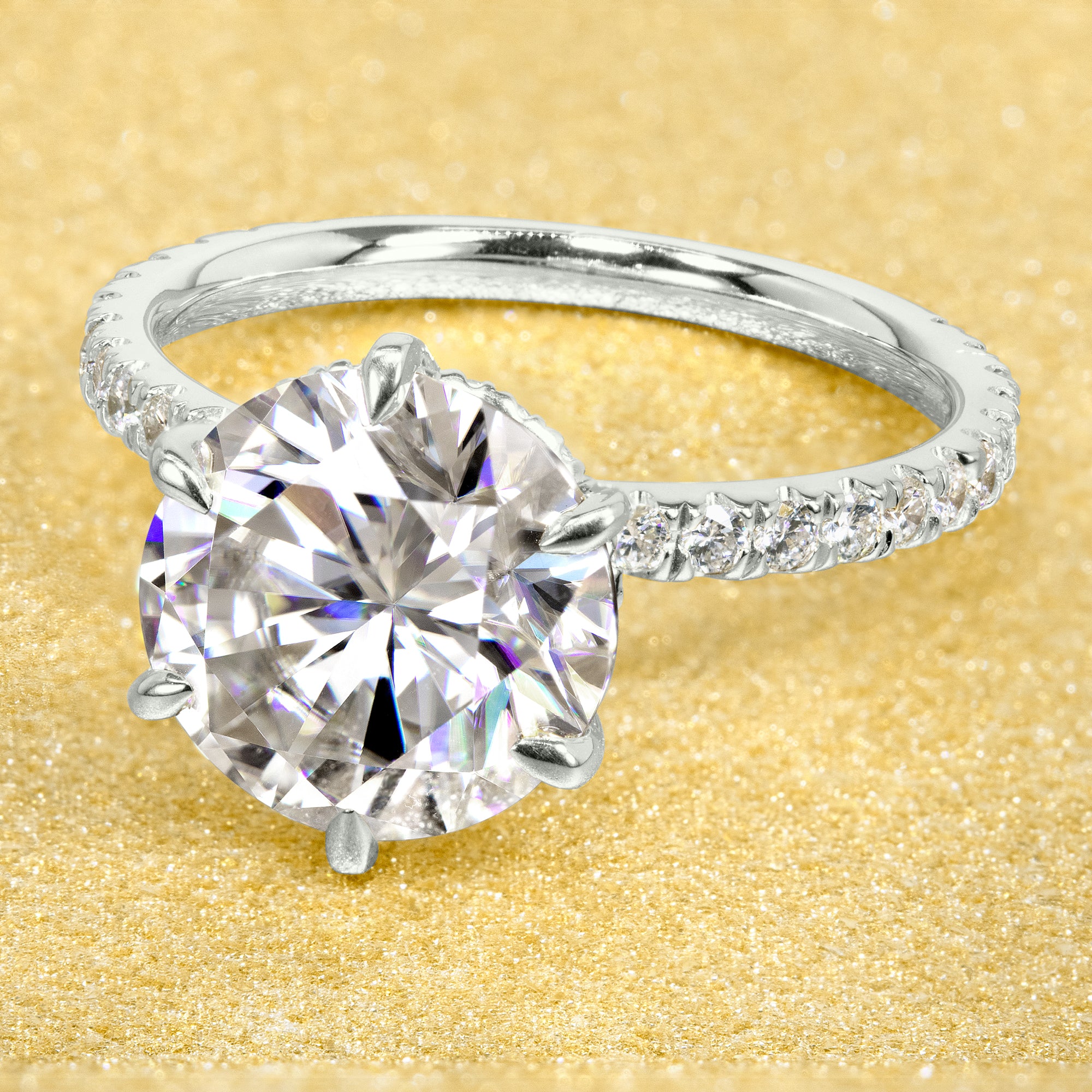 The Selina 3ct Round Brilliant-cut Hidden Eternity Halo Moissanite Engagement Ring, a classic look with an elegant twist complemented by Lab Diamonds handcrafted in 14K gold, 18K gold or Platinum handcrafted in Los Angeles by Earthena Jewelry.