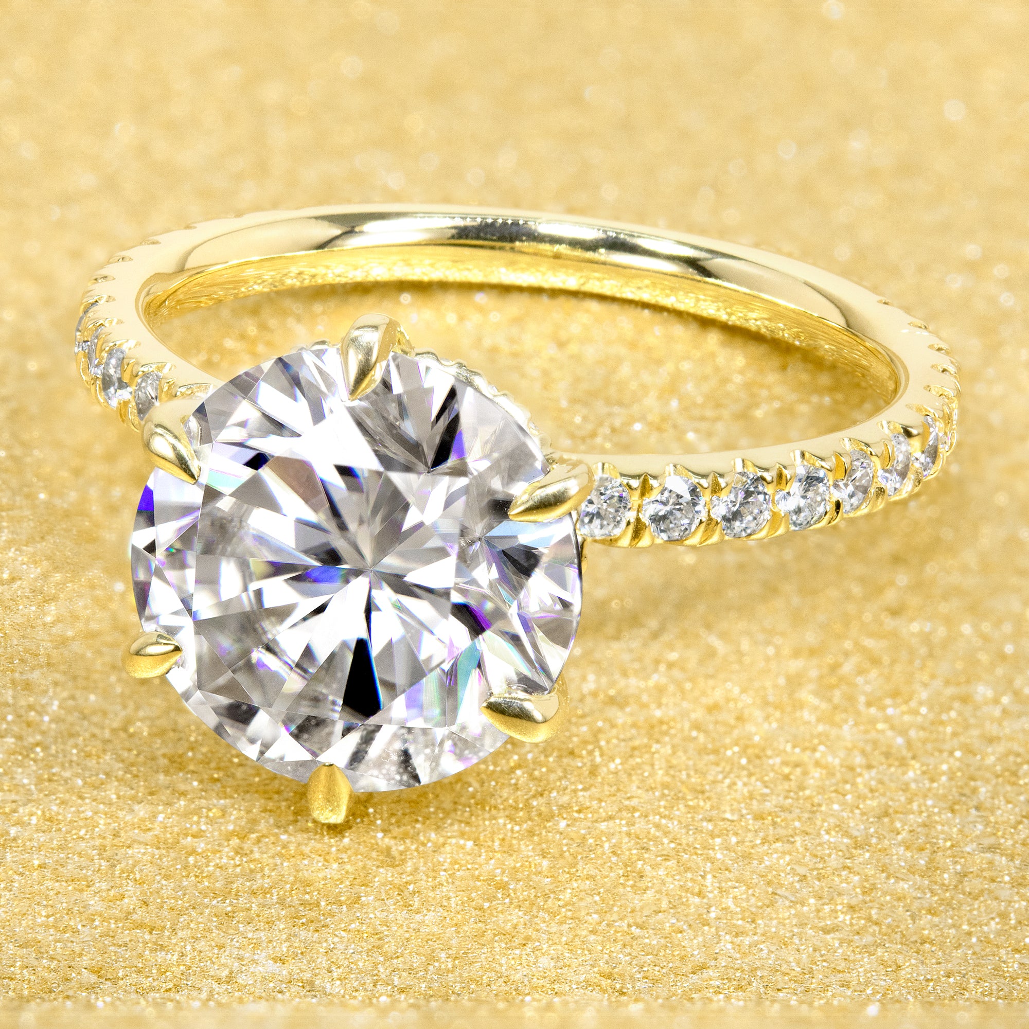 The Selina 3ct Round Brilliant-cut Hidden Eternity Halo Moissanite Engagement Ring, a classic look with an elegant twist complemented by Lab Diamonds handcrafted in 14K gold, 18K gold or Platinum handcrafted in Los Angeles by Earthena Jewelry.