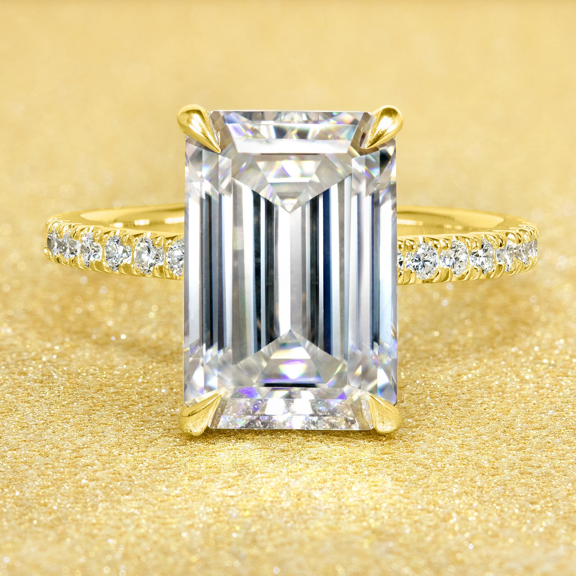 Classic Selina 5ct Elongated Emerald-Cut Lab-Grown Diamond Hidden Halo Engagement Ring in 14K Gold, 18K Gold, or Platinum by Earthena Jewelry of Beverly Hills.