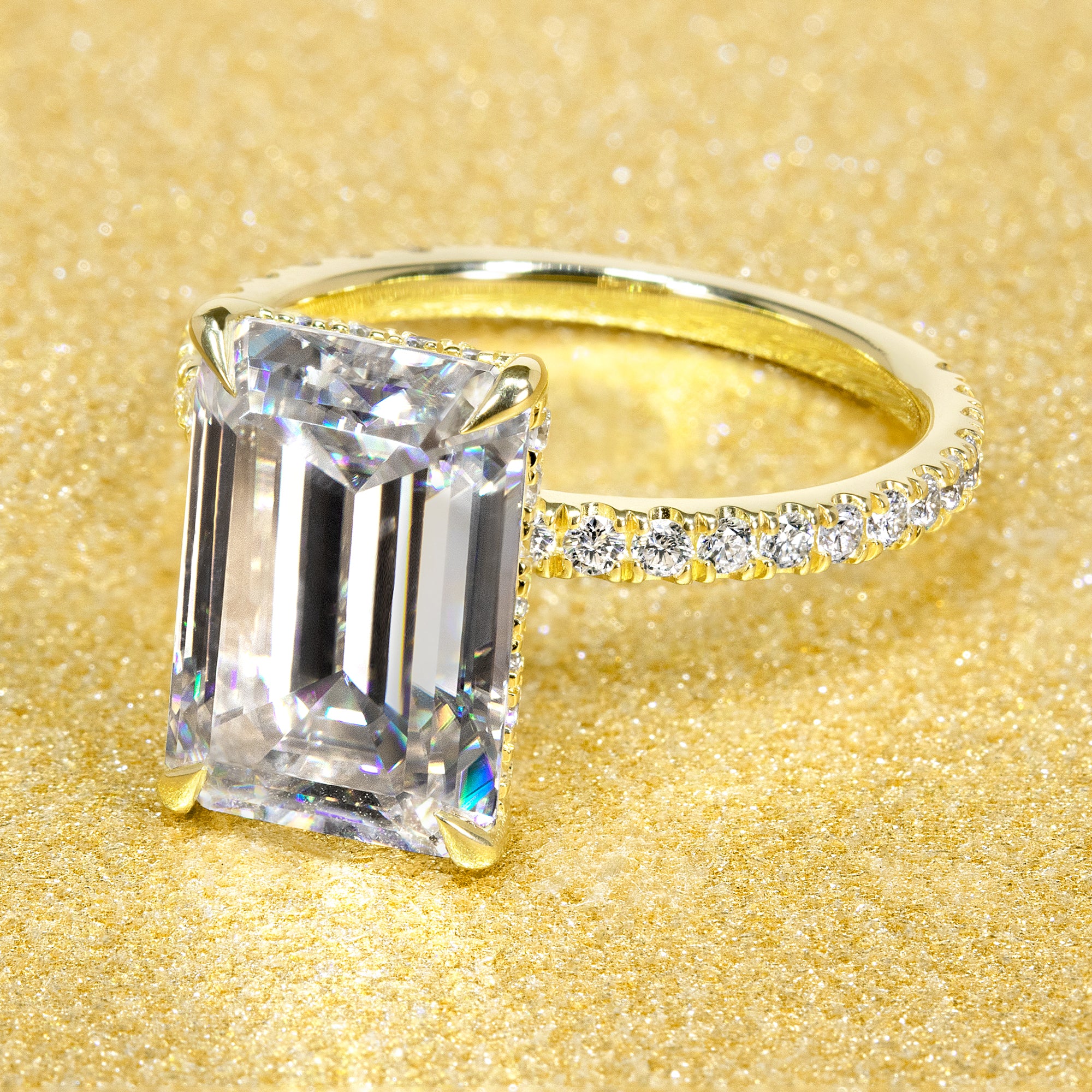 Classic Selina 5ct Elongated Emerald-Cut Lab-Grown Diamond Hidden Halo Engagement Ring in 14K Gold, 18K Gold, or Platinum by Earthena Jewelry of Beverly Hills.