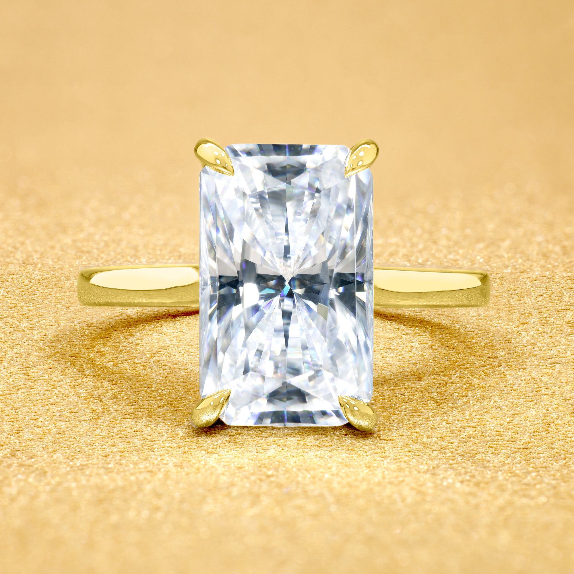 Classic Sofia 5ct Elongated Radiant-Cut Moissanite Cathedral Hidden Halo Diamond Bridge Solitaire Engagement Ring in 14K Gold, 18K Gold, or Platinum by Earthena Jewelry of Beverly Hills.