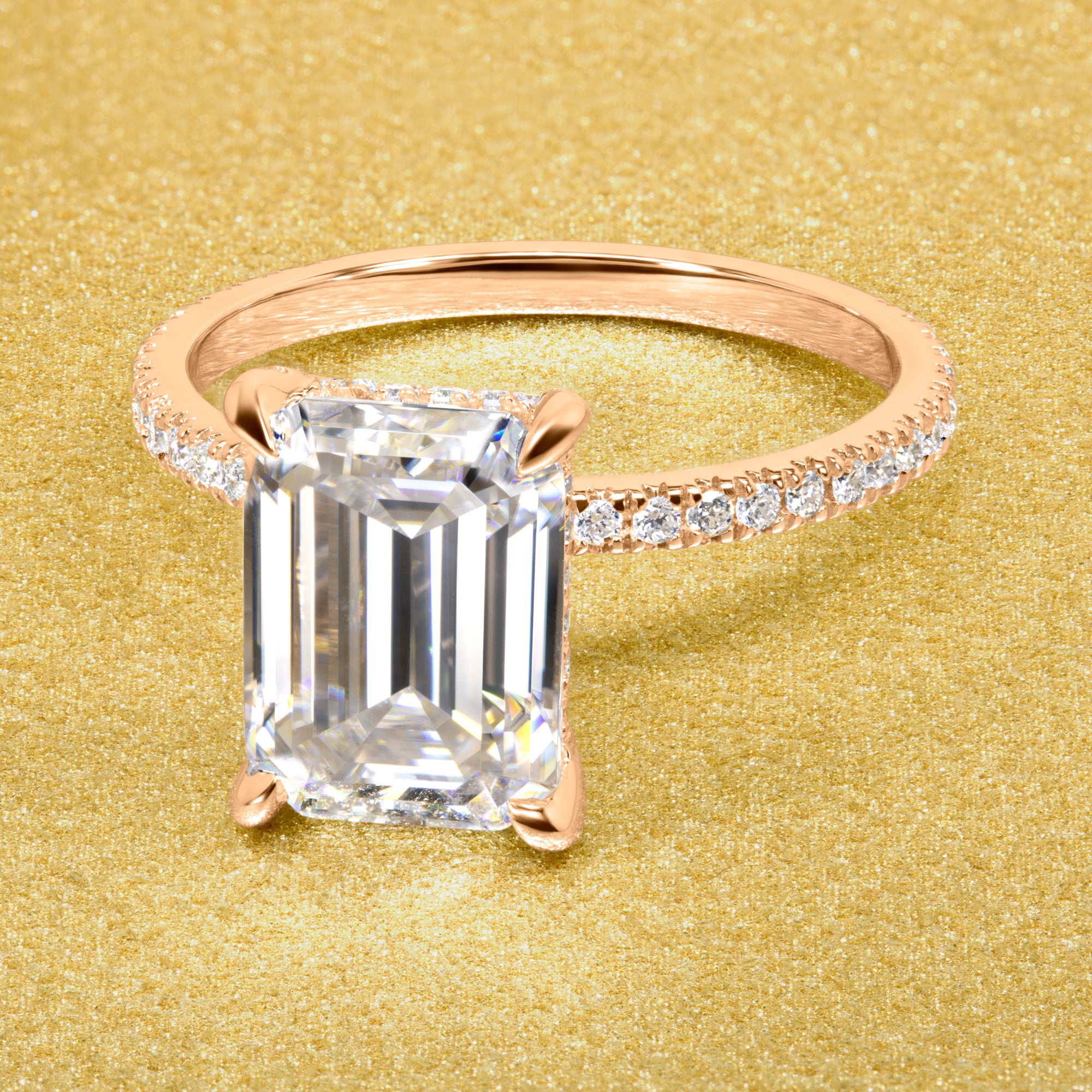 Classic Stella 3.5ct Elongated Emerald-cut Moissanite Hidden Wrap Halo and Lab-grown Diamond Engagement ring in 14K or 18K Gold handcrafted in Los Angles by Earthena Jewelry.