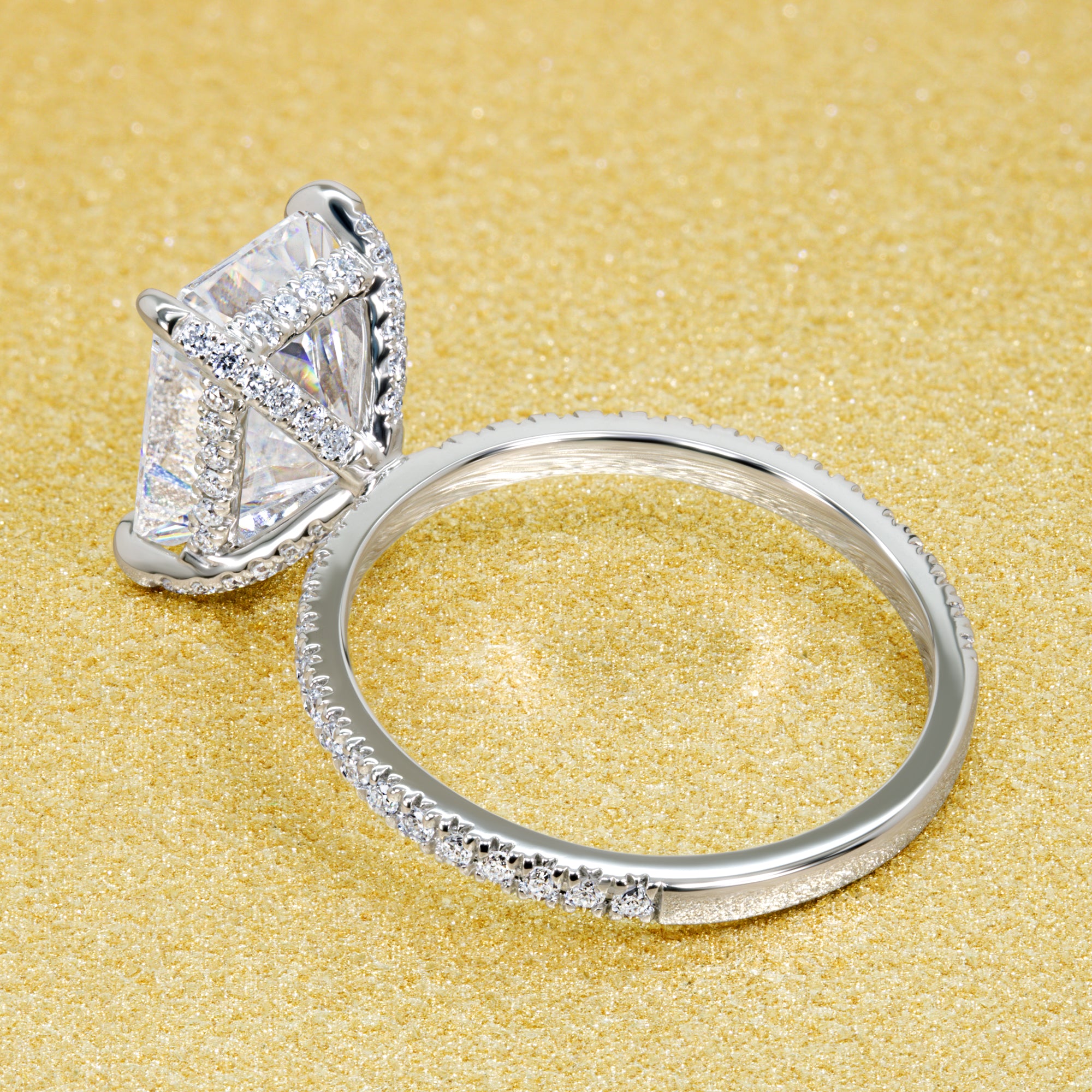 Stella 3.5ct Elongated Radiant-cut Moissanite and Lab-grown Diamond Hidden Wrap Halo Engagement Ring handcrafted in 14K or 18K Gold by Earthena Jewelry