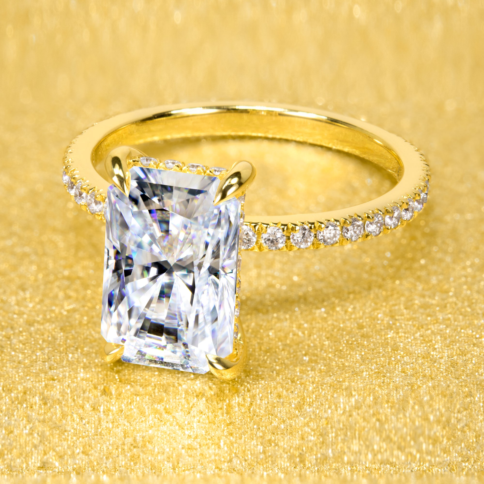 The Stella Ring beautifully combines a timeless design with handcrafted moissanite stone and lab-grown diamond accents set in 14K gold, 18K gold, or Platinum handcrafted in Los Angeles by Earthena Jewelry.
