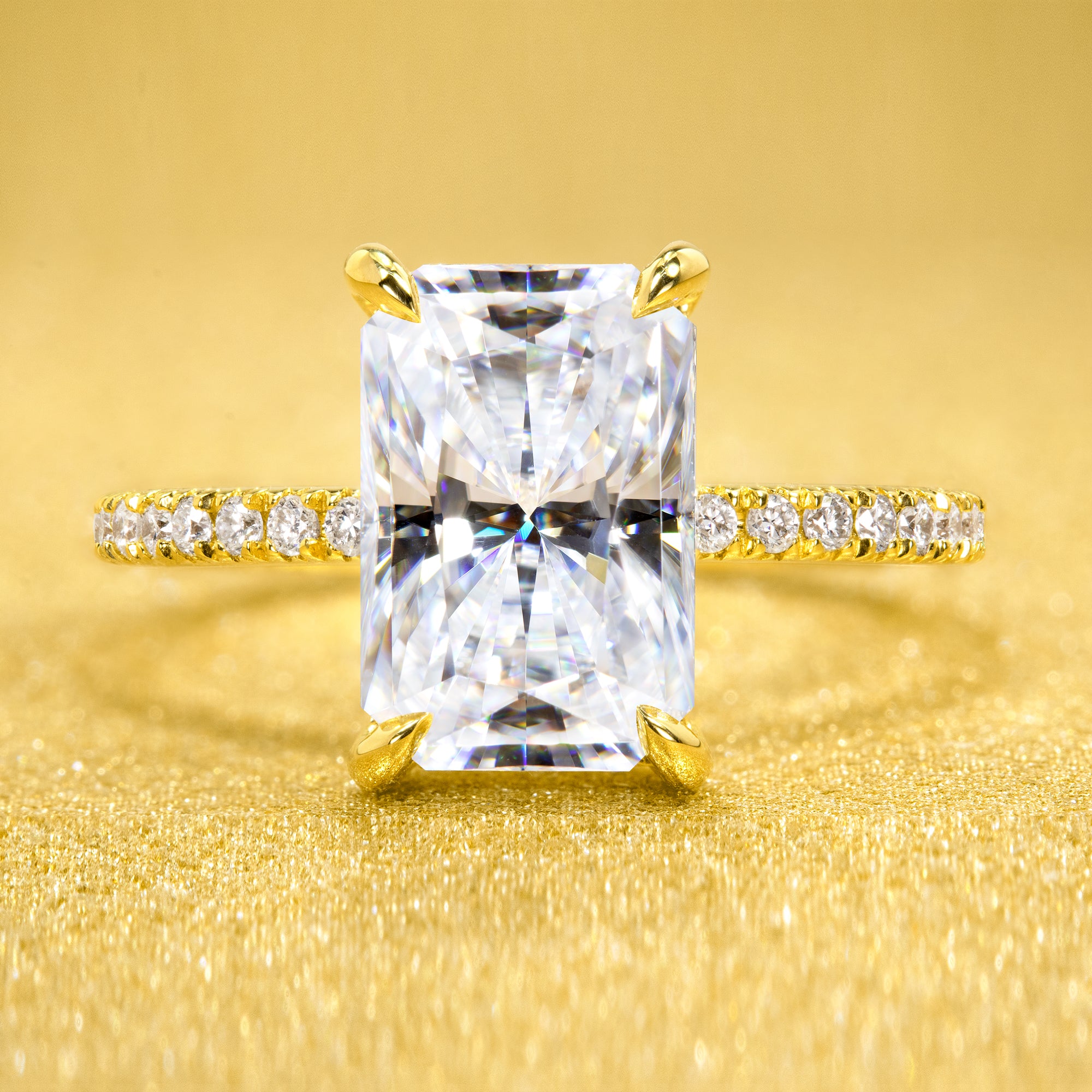 The Stella Ring beautifully combines a timeless design with handcrafted moissanite stone and lab-grown diamond accents set in 14K gold, 18K gold, or Platinum handcrafted in Los Angeles by Earthena Jewelry.