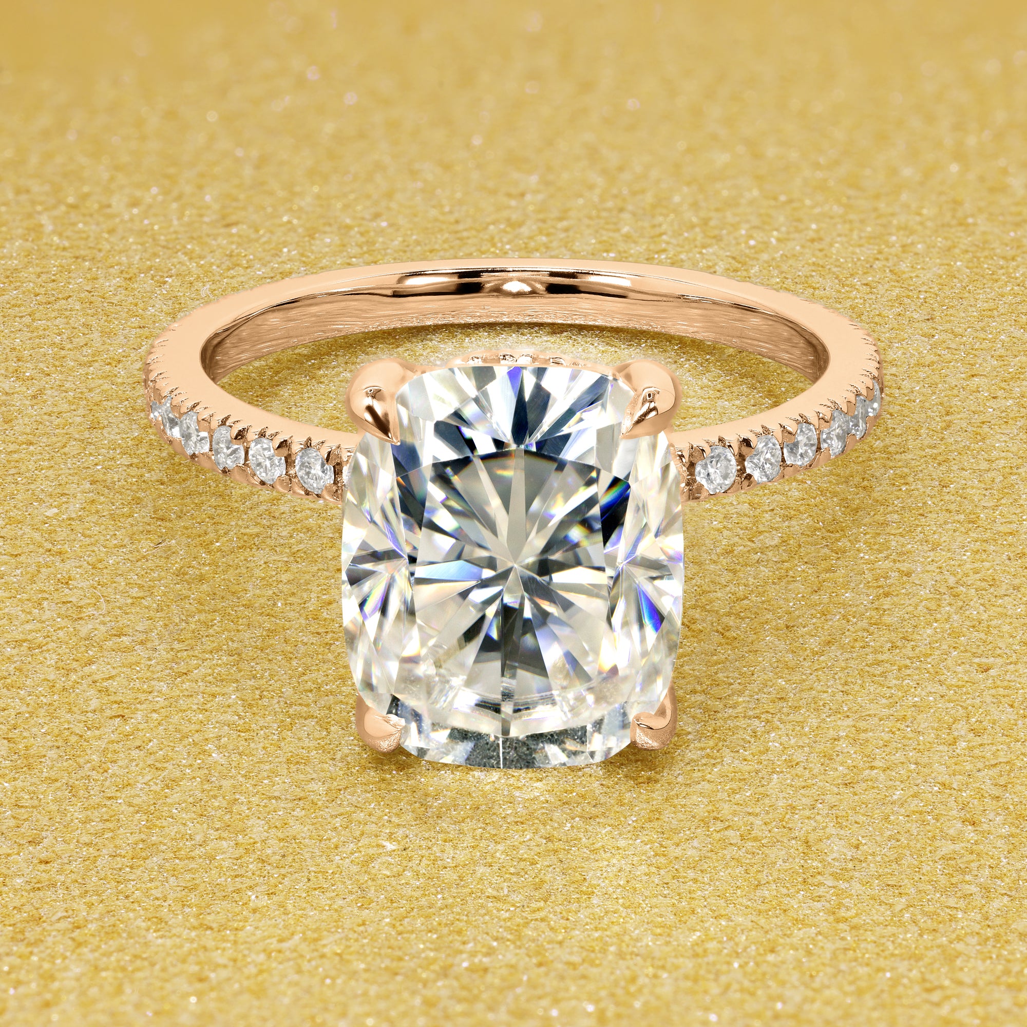 The Stella Elongated Brilliant-cut Cushion-cut Pave band Hidden Halo Moissanite Engagement Ring is a classic look with an elegant twist complemented by Moissanite stones handcrafted in 14K Gold, 18K Gold, or Platinum handcrafted in Los Angeles by Earthena Jewelry.