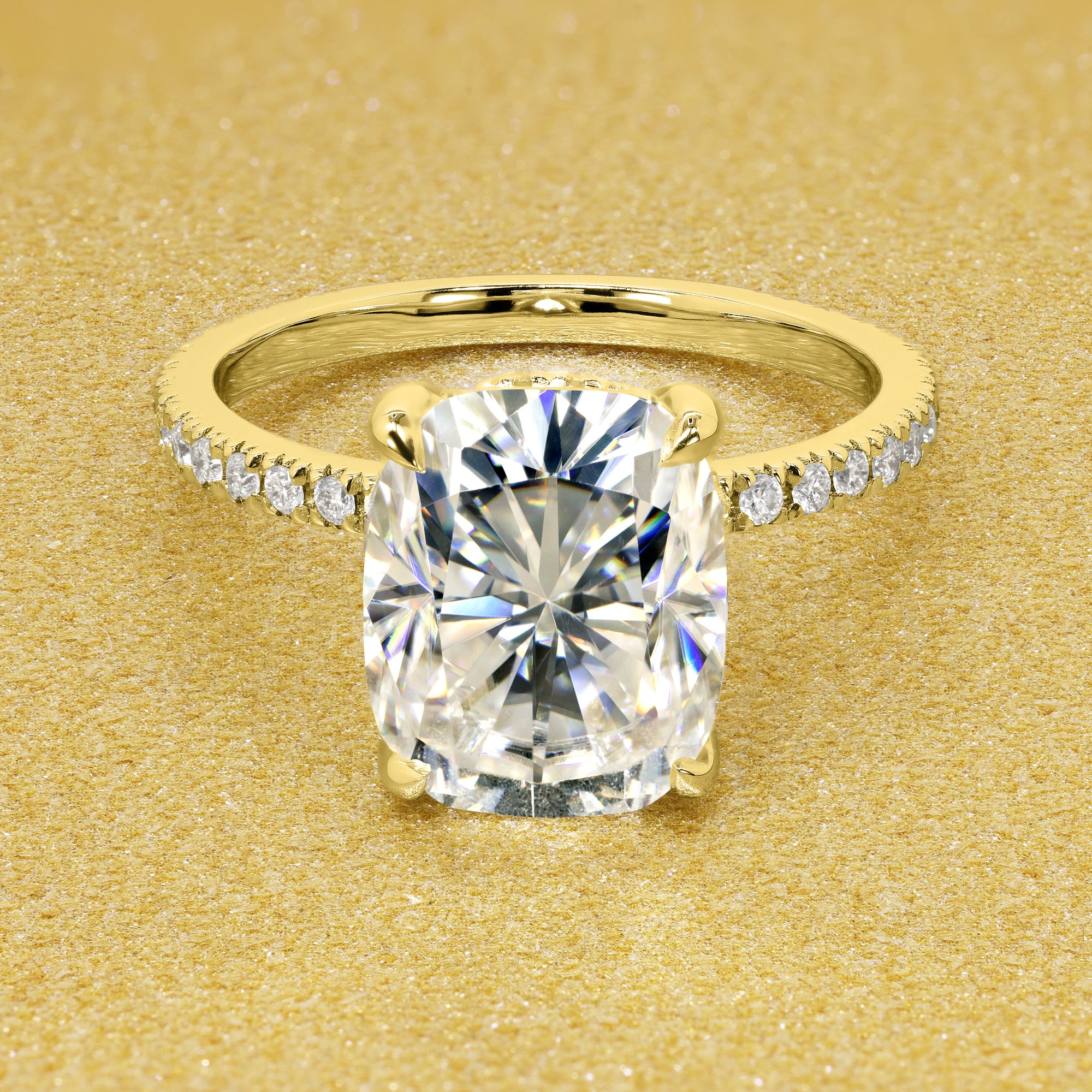 The Stella Elongated Brilliant-cut Cushion-cut Pave band Hidden Halo Moissanite Engagement Ring is a classic look with an elegant twist complemented by Moissanite stones handcrafted in 14K Gold, 18K Gold, or Platinum handcrafted in Los Angeles by Earthena Jewelry.