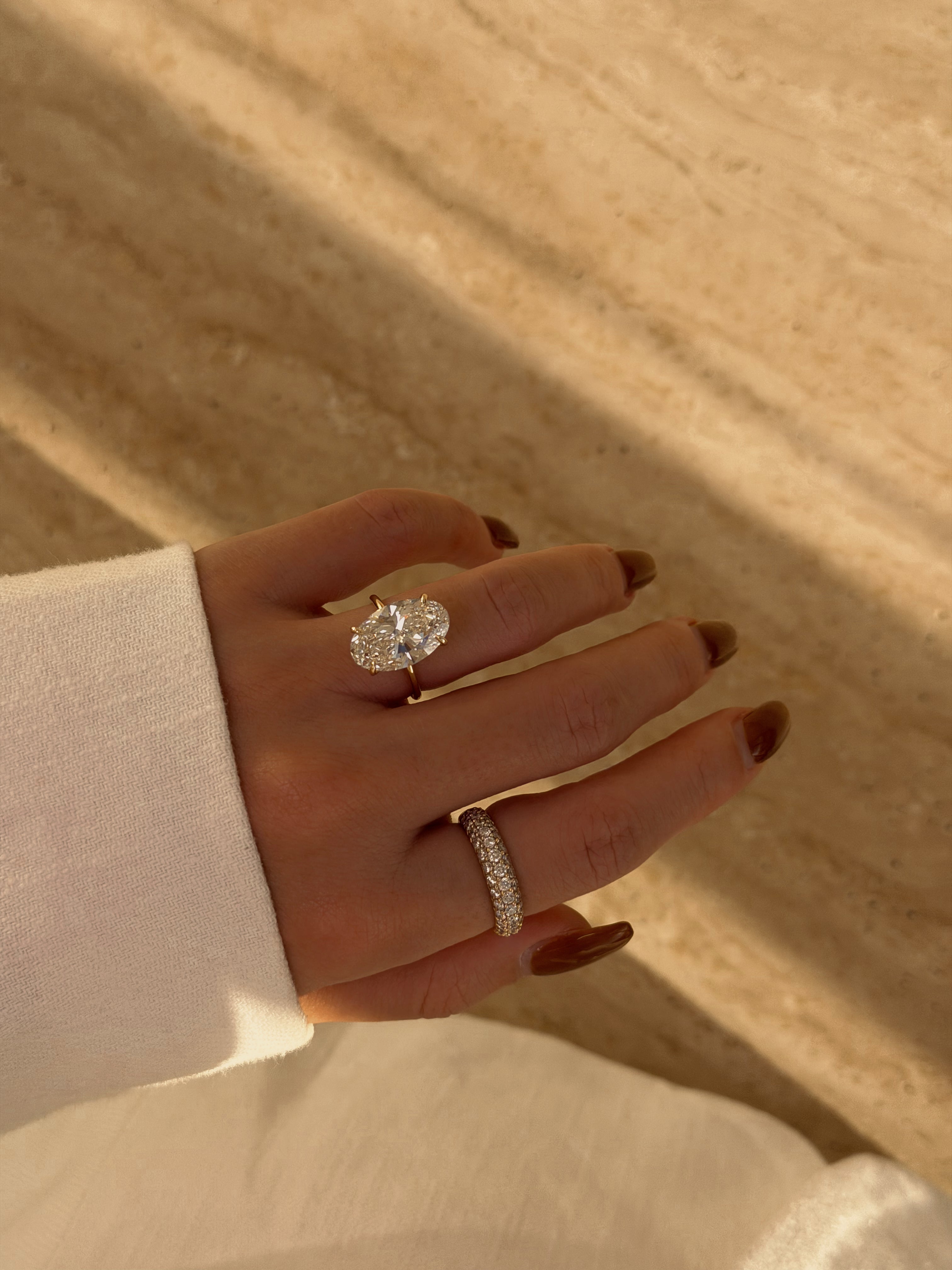 The Ariela, 6.11ct Elongated Oval-cut Lab-grown Diamond Hidden Eternity Halo Ring