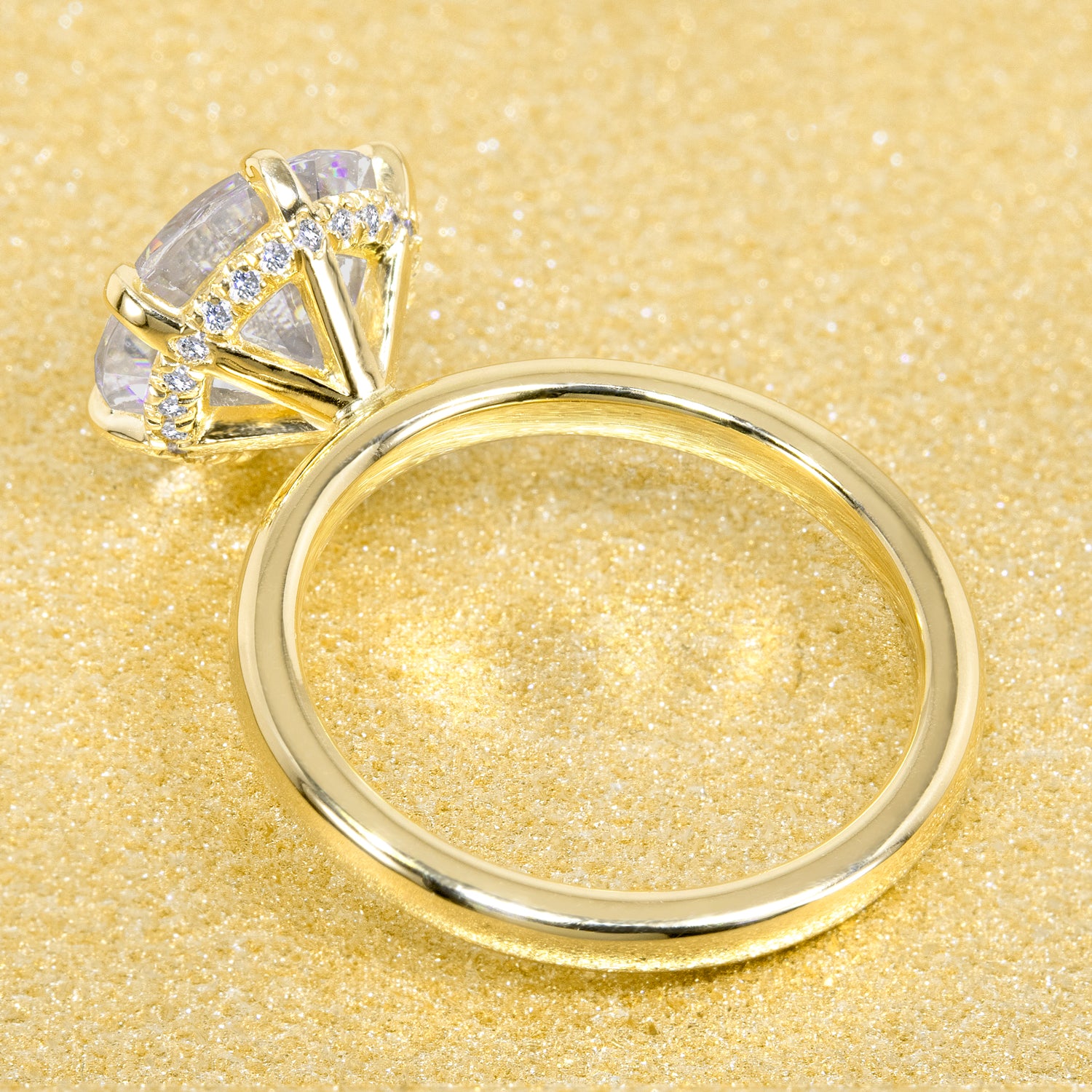 The Adara 3ct Round Brilliant-cut Moissanite Hidden Eternity Halo Engagement Ring is a classic solitaire look with an elegant twist complemented by Lab Diamonds handcrafted in 14K Gold, 18K Gold, or Platinum by Earthena Jewelry of Beverly Hills.