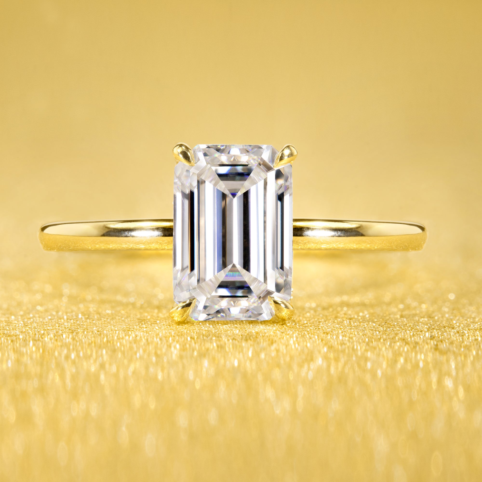Classic and Minimalistic Ariela 1.5ct Elongated Emerald-cut Moissante Halo Solitaire Engagement ring complemented by Lab Diamonds handcrafted in 14K Gold, 18K Gold, or Platinum by Earthena Jewelry of Beverly Hills.