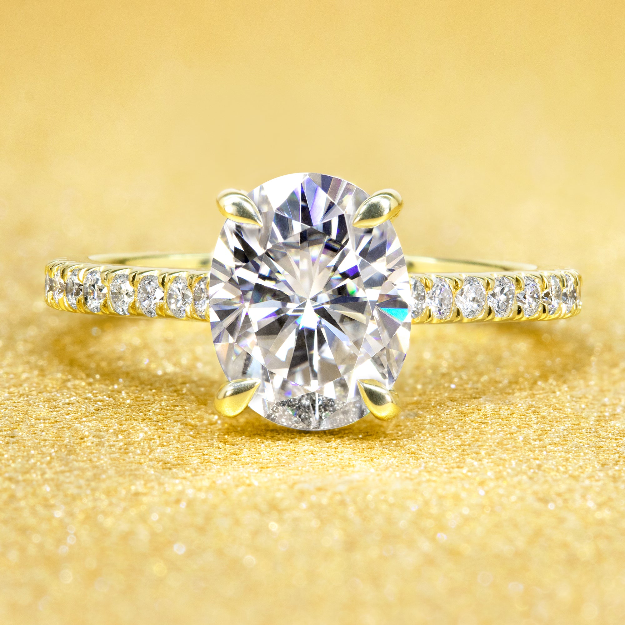 Classic Emilia 2ct Oval-cut Moissanite Hidden Halo Diamond Bridge Cathedral Style Engagement ring in 14K Gold, 18K Gold, or Platinum by Earthena Jewelry of Beverly Hills.
