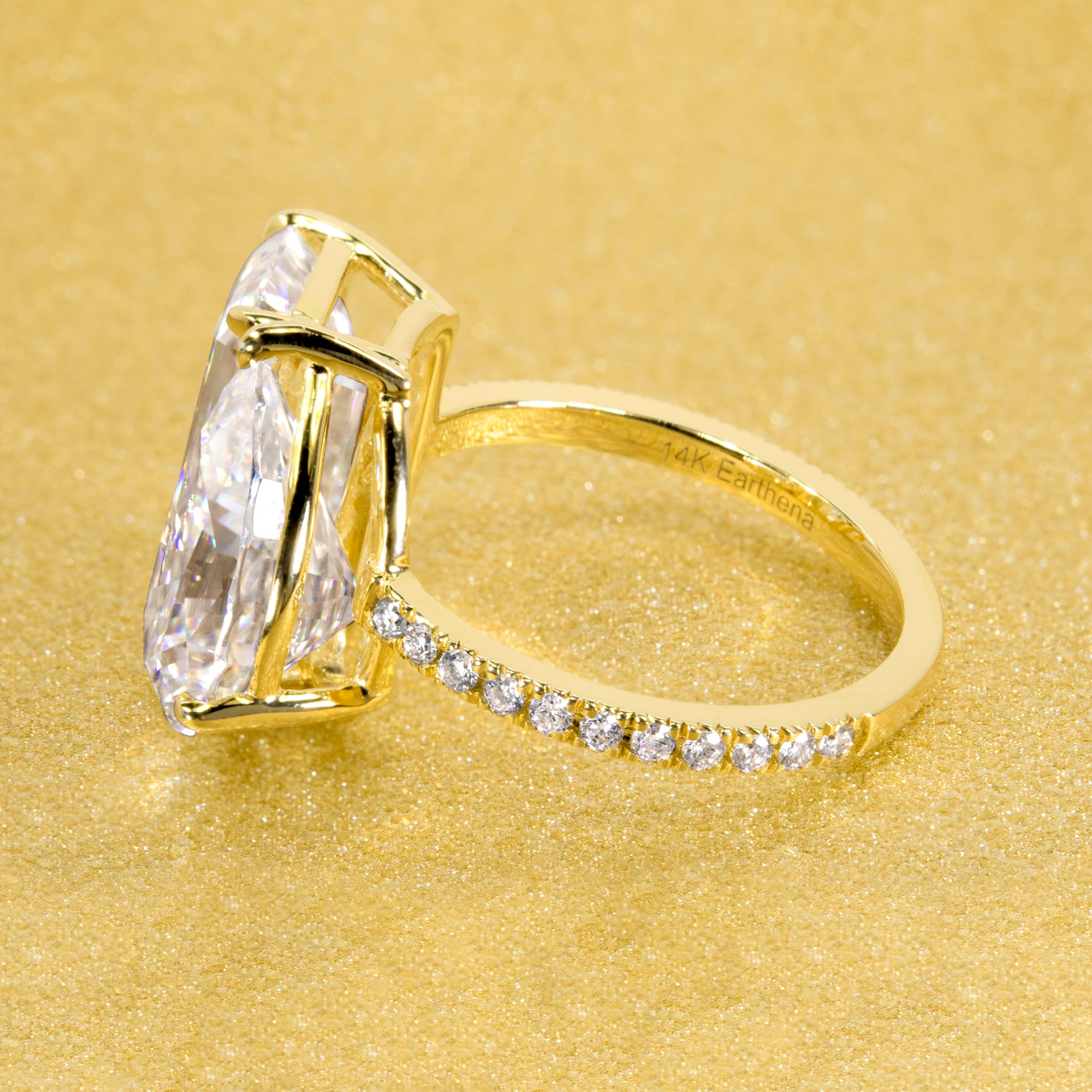 This timeless "Toi et Moi" Gemini engagement ring showcases a captivating combination of a 3.75ct elongated radiant-cut and a 2.25ct pear-shaped moissanite, styled with lab-grown side diamonds. The ring is available in 14K Gold, 18K Gold, or Platinum by Earthena Jewelry of Beverly HIlls.