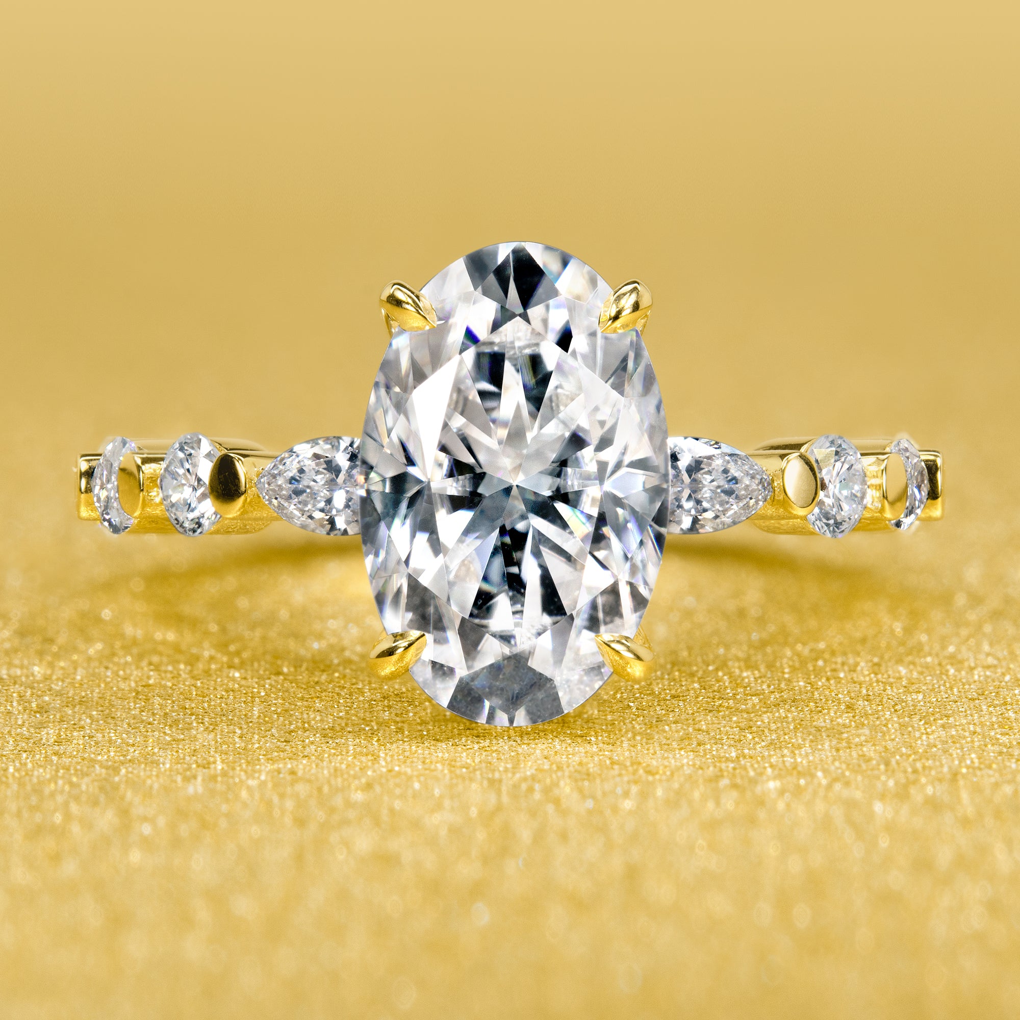 Modern and Sleek, this Grace design features a hidden halo with floating marquise and round diamonds showcasing a unique Moissanite or lab-grown diamond center.