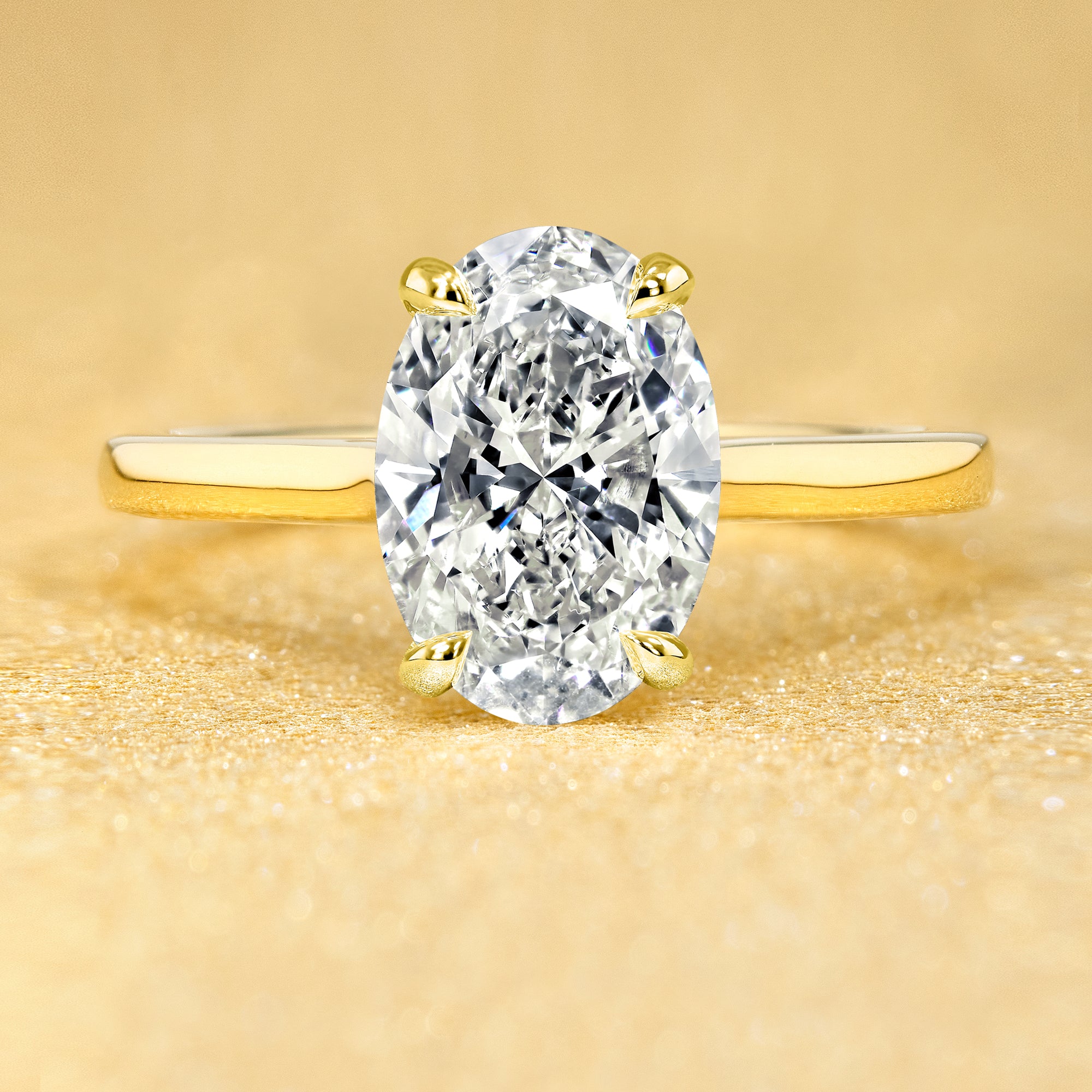 The Sofia, 2ct Elongated Oval-Cut Lab-Grown Diamond Cathedral Engagement Ring with Diamond Bridge in 14K Gold, 18K Gold, or Platinum by Earthena Jewelry of Beverly Hills.