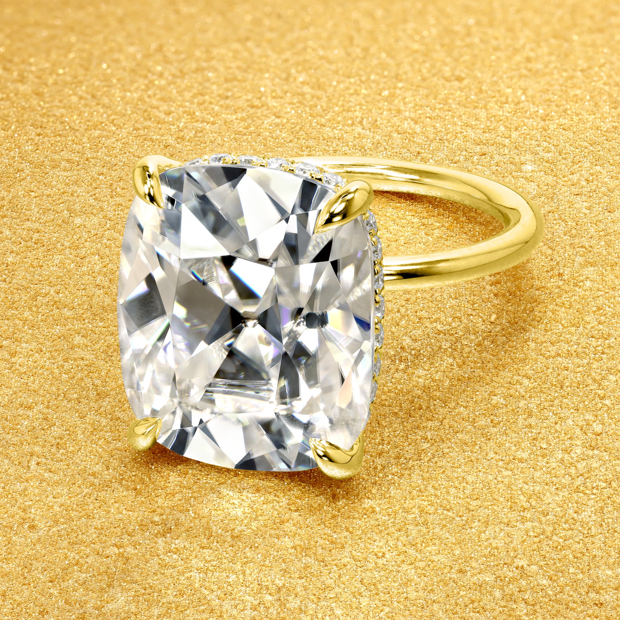 The Adara Elongated Old Mine Cushion-cut Hidden Halo Moissanite Engagement Ring, a classic look with an elegant twist complemented by Lab Diamonds handcrafted in 14K gold, 18K gold, or Platinum by Earthena Jewelry of Beverly Hills.