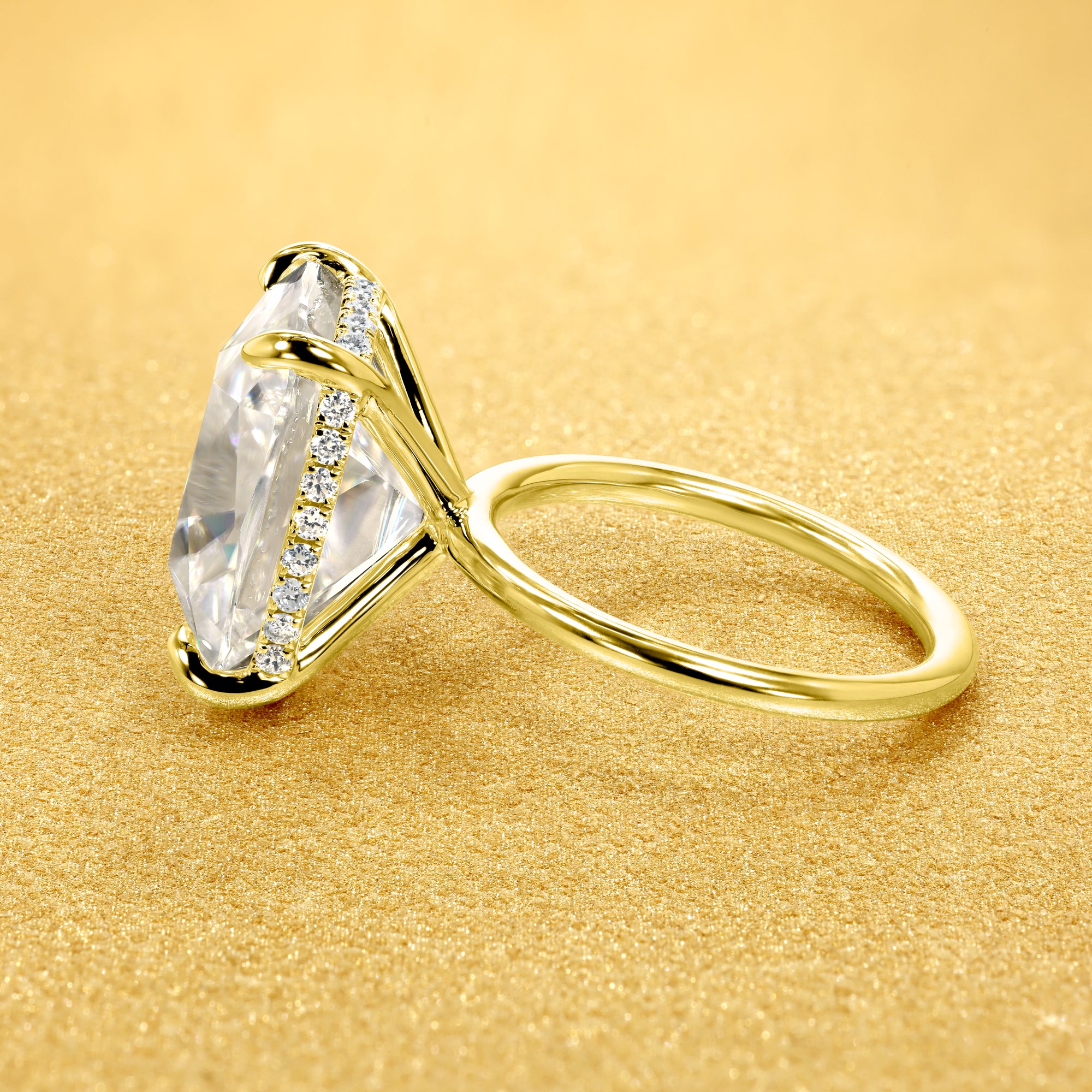 The Adara Elongated Old Mine Cushion-cut Hidden Halo Moissanite Engagement Ring, a classic look with an elegant twist complemented by Lab Diamonds handcrafted in 14K gold, 18K gold, or Platinum by Earthena Jewelry of Beverly Hills.
