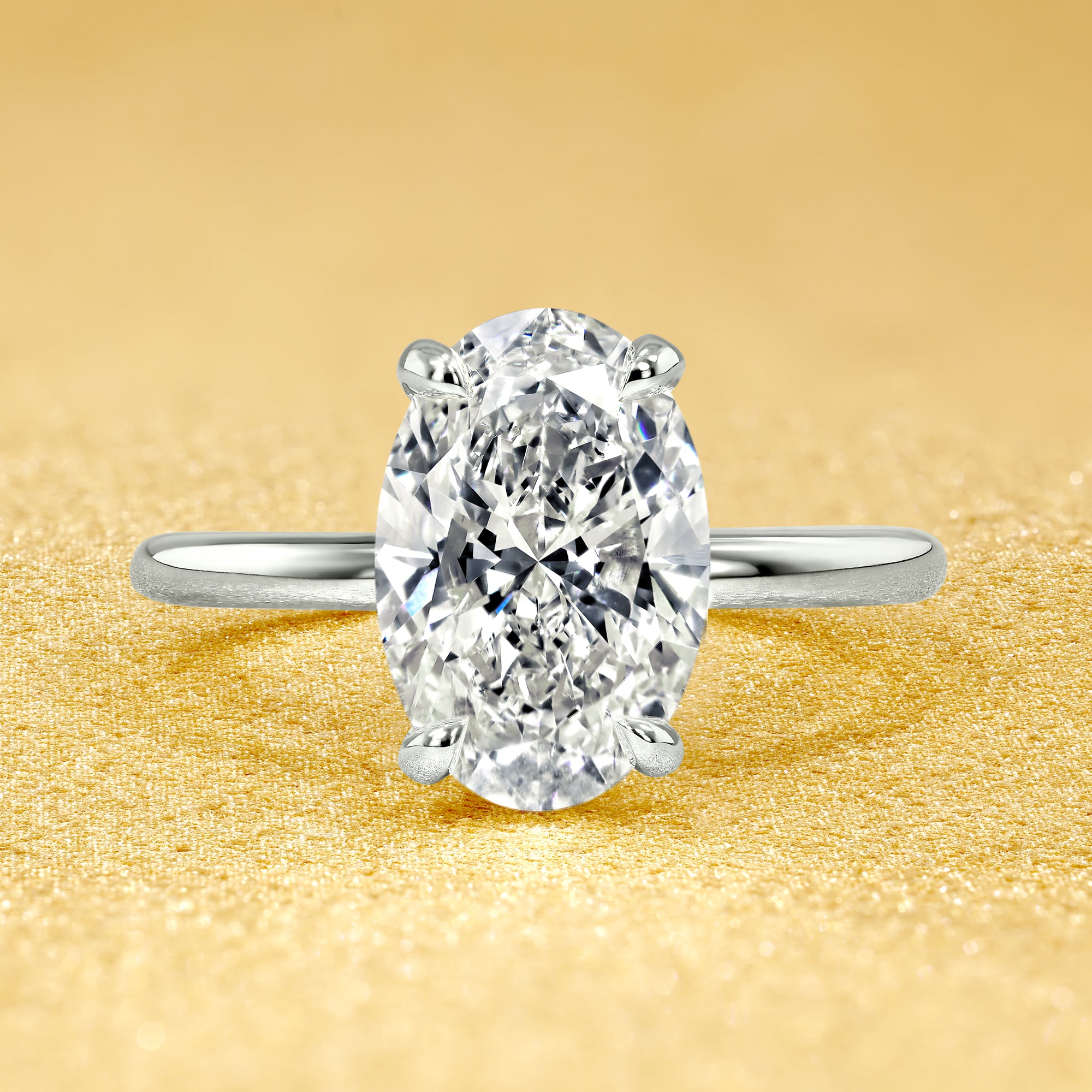 The Adara, 2ct Elongated Oval-Cut Lab-Grown Diamond Hidden Halo Engagement Ring in 14K Gold, 18K Gold, or Platinum by Earthena Jewelry of Beverly Hills.