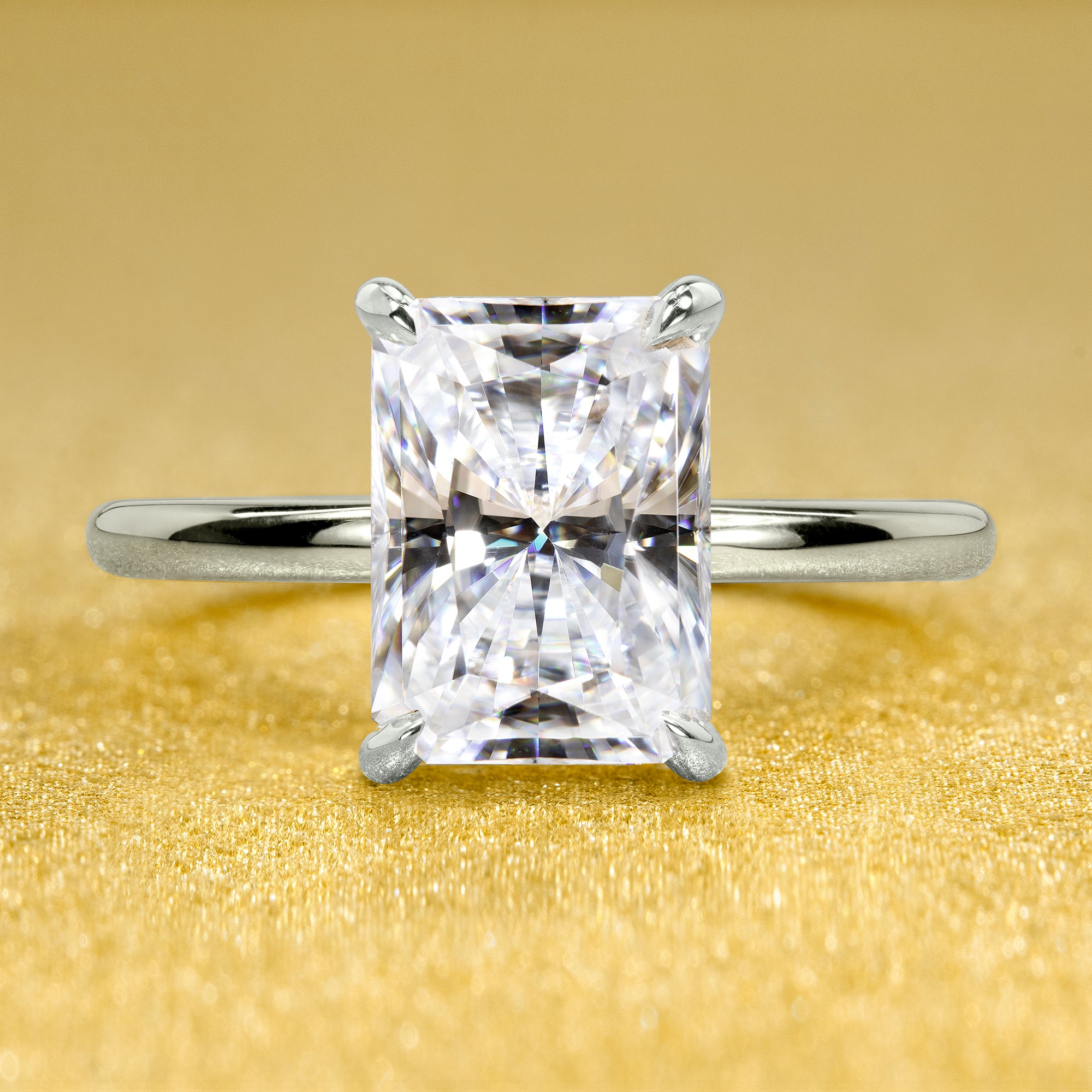 The Adara, 3ct Elongated Pear-Cut Lab-Grown Diamond Hidden Halo Engagement Ring in 14K Gold, 18K Gold, or Platinum by Earthena Jewelry of Beverly Hills.