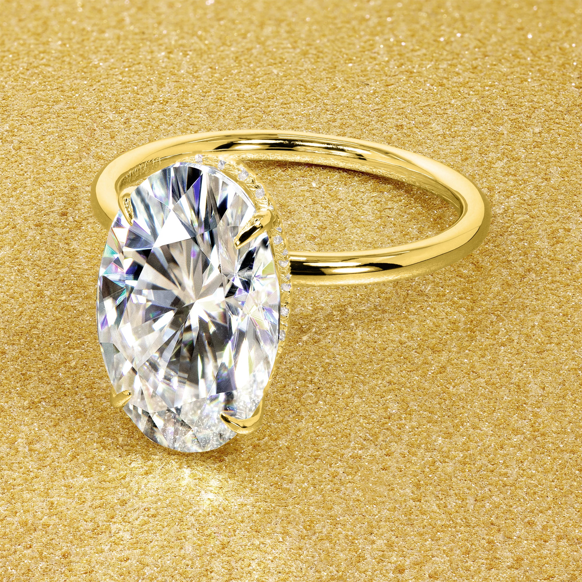 Classic Ariela 7ct Elongated Oval-cut Moissanite and Lab Diamond Hidden Halo Solitaire ring in 14K gold, 18K gold, or Platinum handcrafted in Los Angeles by Earthena Jewelry