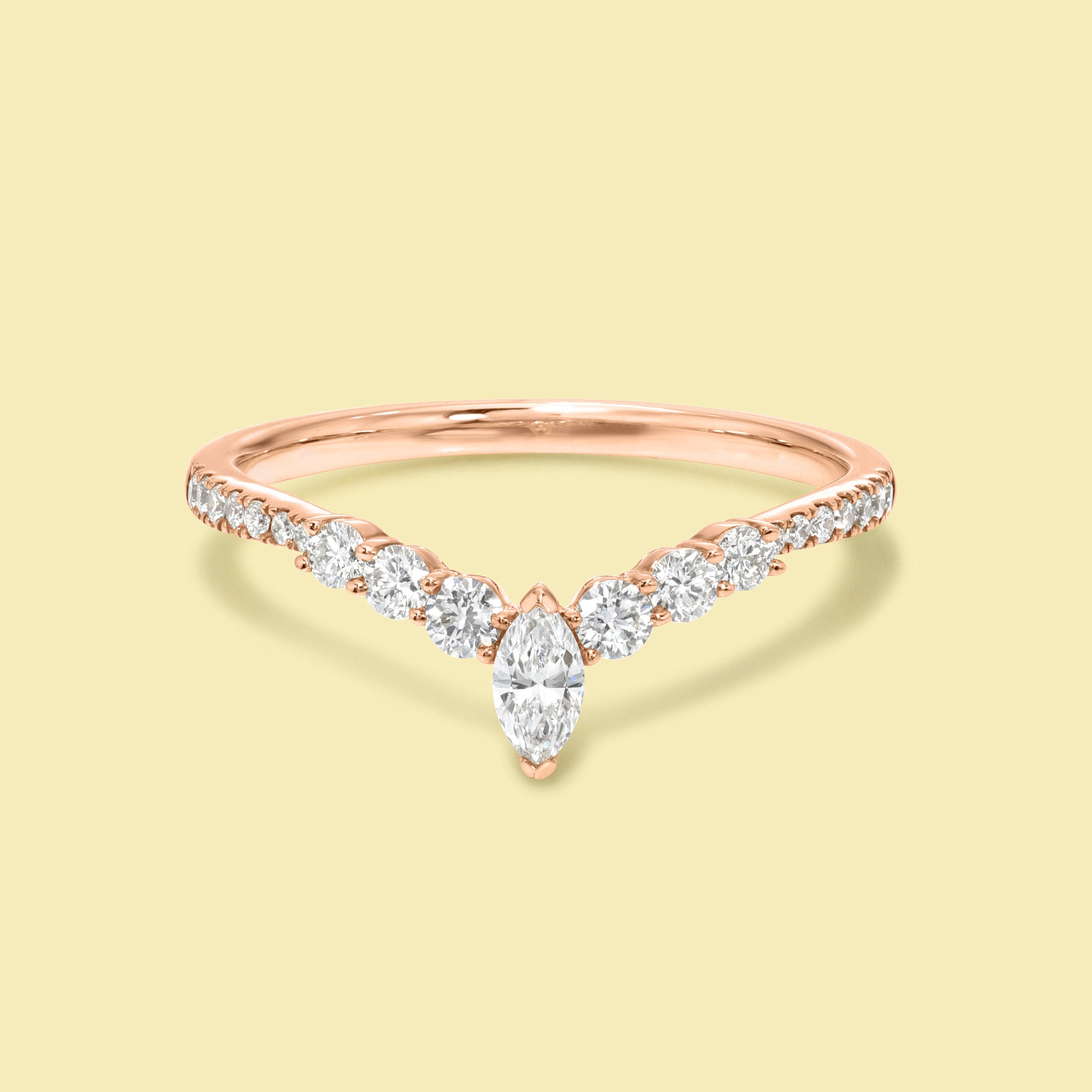 The Audrey, Curved V-shaped Diamond Band is handcrafted in 14K gold, 18K gold, or Platinum by Earthena Jewelry in Los Angeles