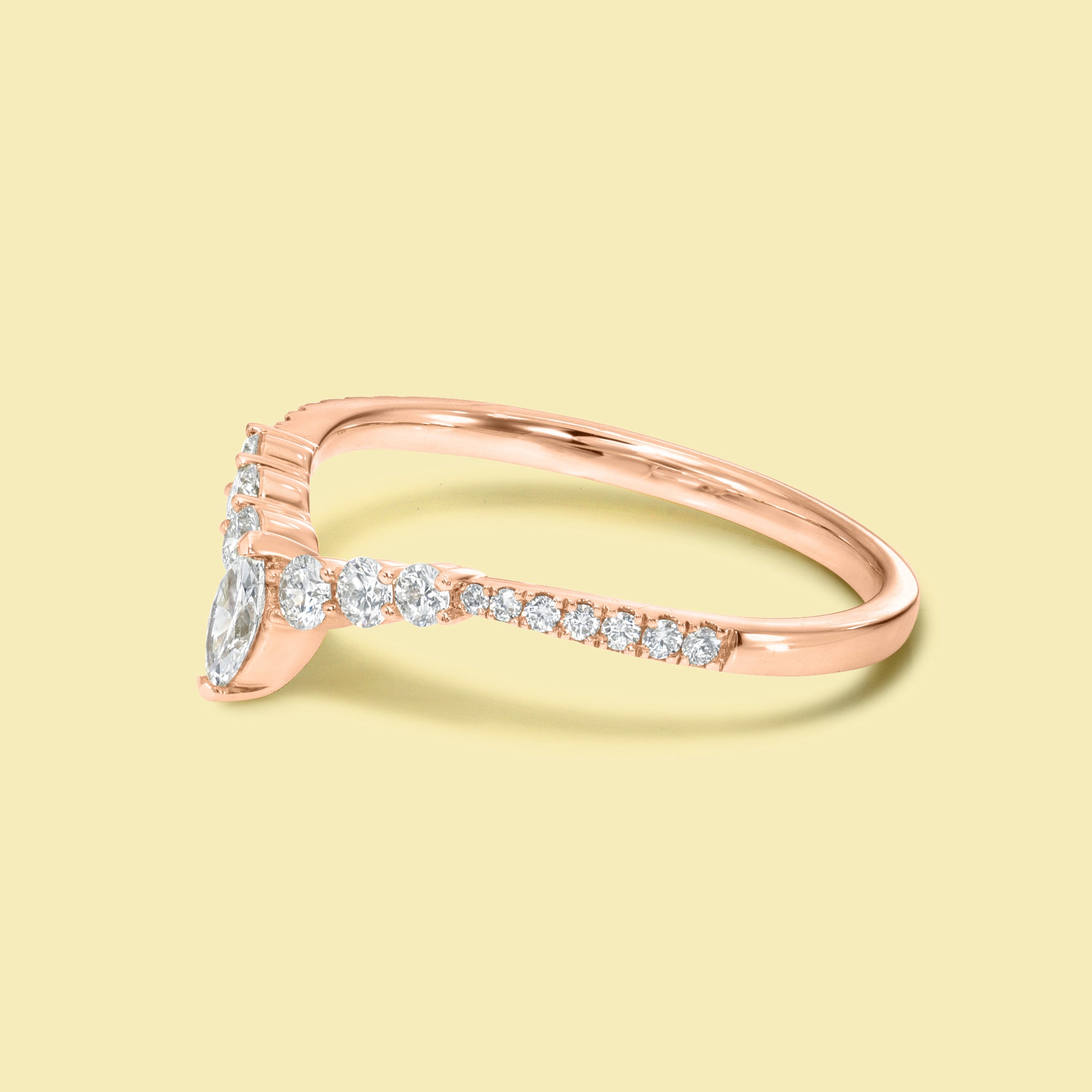 The Audrey, Curved V-shaped Diamond Band is handcrafted in 14K gold, 18K gold, or Platinum by Earthena Jewelry in Los Angeles