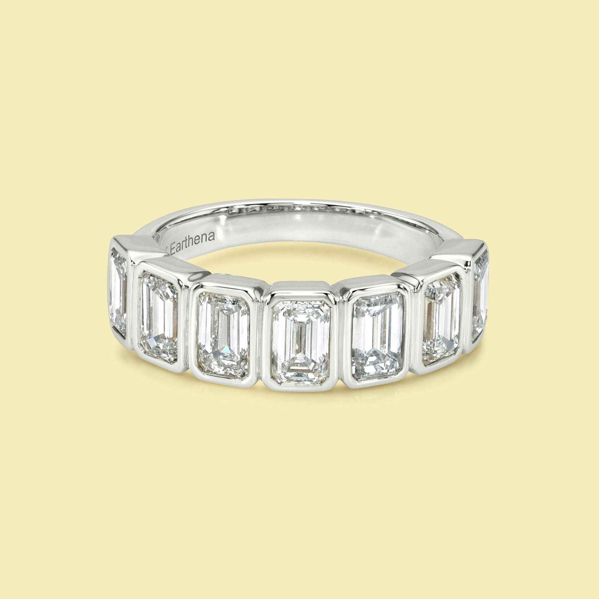 The Charlotte Emerald cut Bezel Half Eternity lab-grown diamond Band handcrafted in 14K gold, 18K gold, and Platinum by Earthena Jewelry