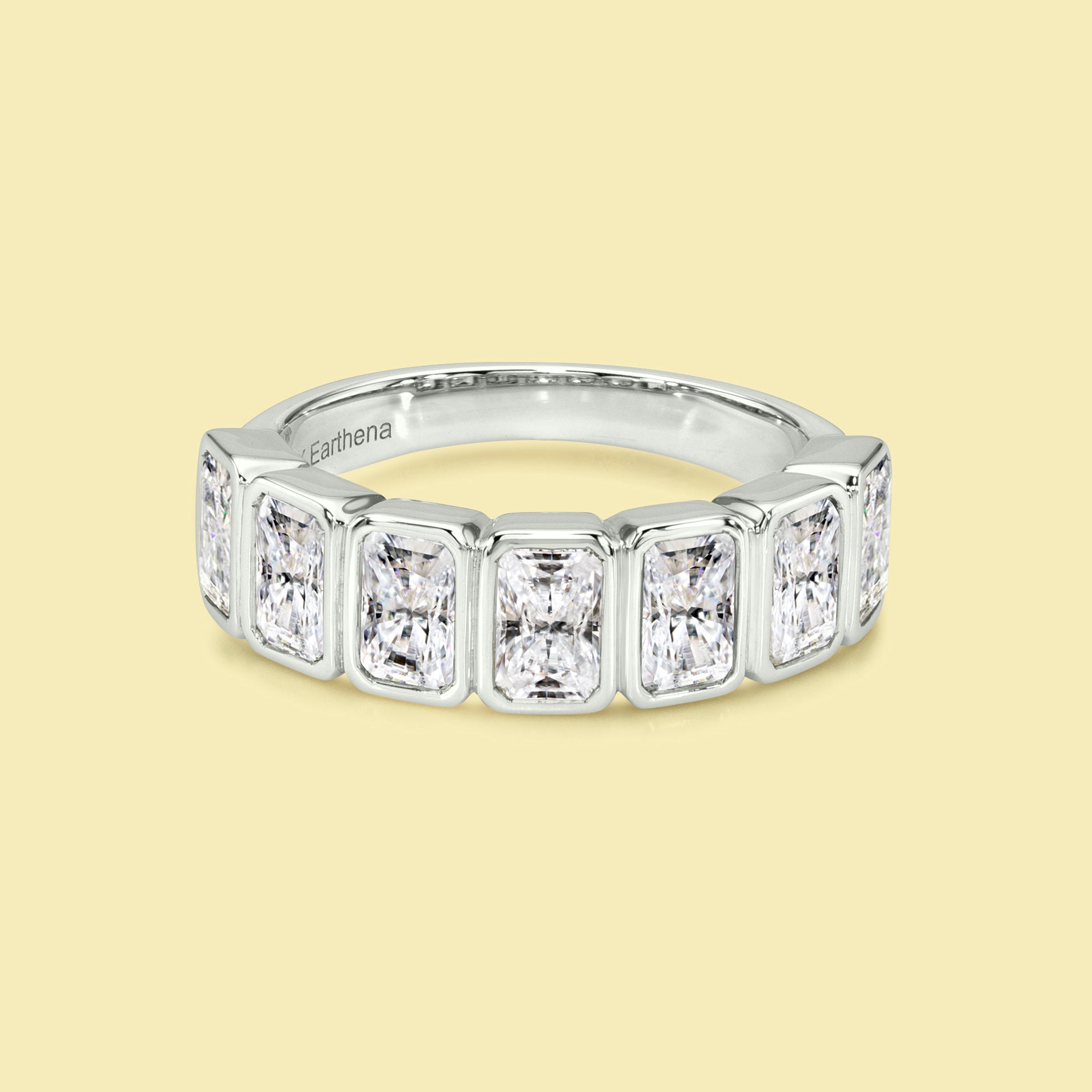 The Charlotte, Bezel-set Radiant-cut Diamond Half Eternity Band handcrafted by Earthena Jewelry