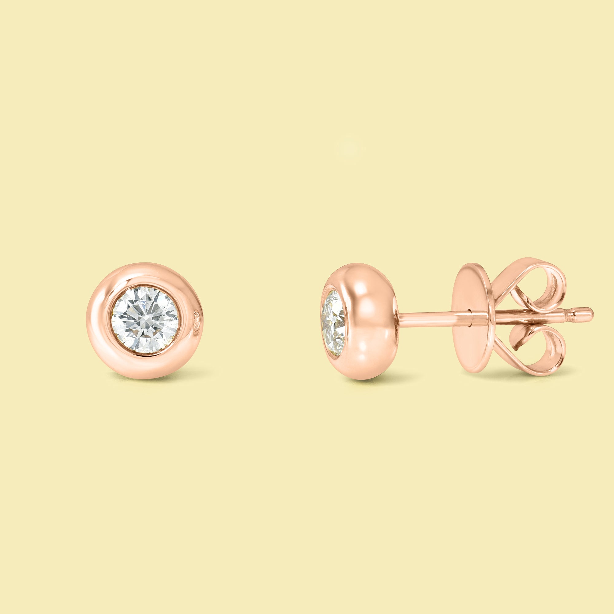 The Cloud, Bezel-Set Round Diamond Stud Earrings are handcrafted in 14K gold, 18K gold, or Platinum by Earthena Jewelry in Los Angeles