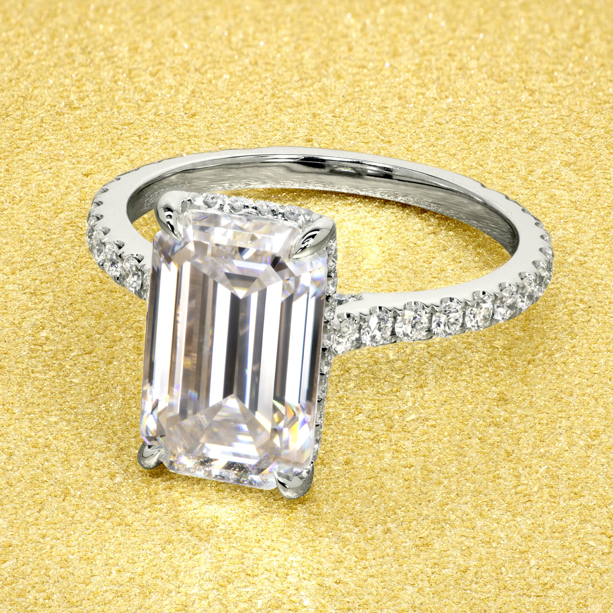 Classic Emilia 4.25ct Elongated Emerald-cut Diamond Bridge Hidden Halo Cathedral Style Engagement ring in 14K gold, 18K gold, or Platinum handcrafted in Los Angeles by Earthena Jewelry