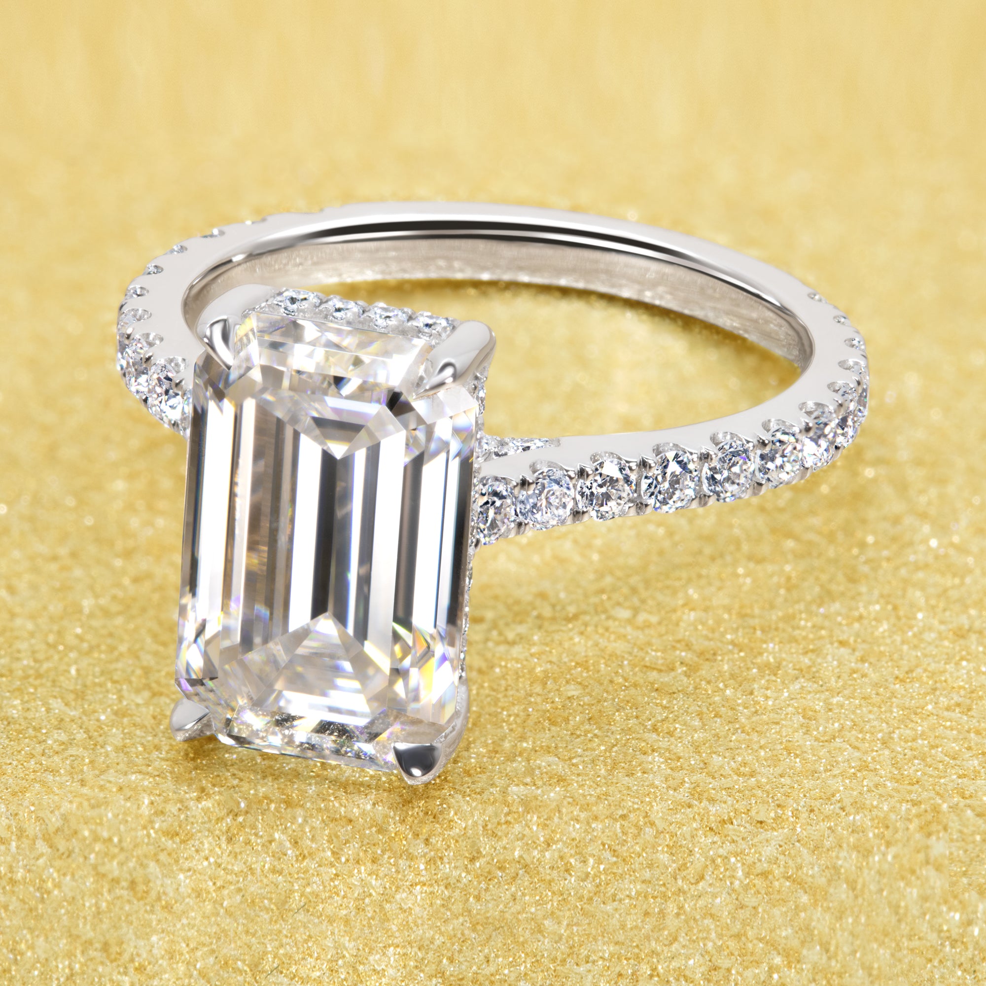 Classic Emilia 3.5ct Elongated Emerald-cut Diamond Bridge Hidden Halo Cathedral Style Engagement ring in 14K gold, 18K gold, or Platinum handcrafted in Los Angeles by Earthena Jewelry