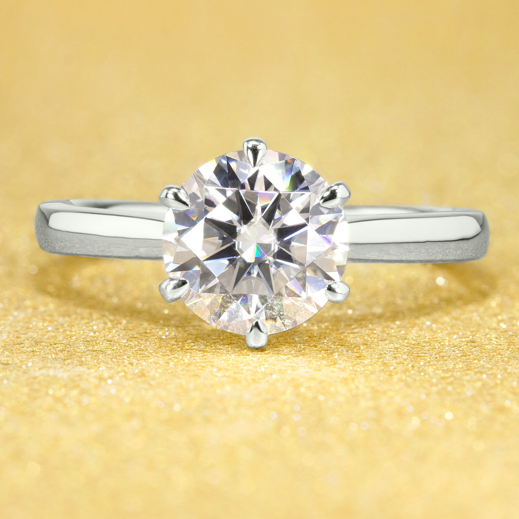 The Eva, 2ct Round Brilliant-Cut Lab-Grown Diamond Solitaire Engagement Ring in 14K Gold, 18K Gold, or Platinum by Earthena Jewelry of Beverly Hills.
