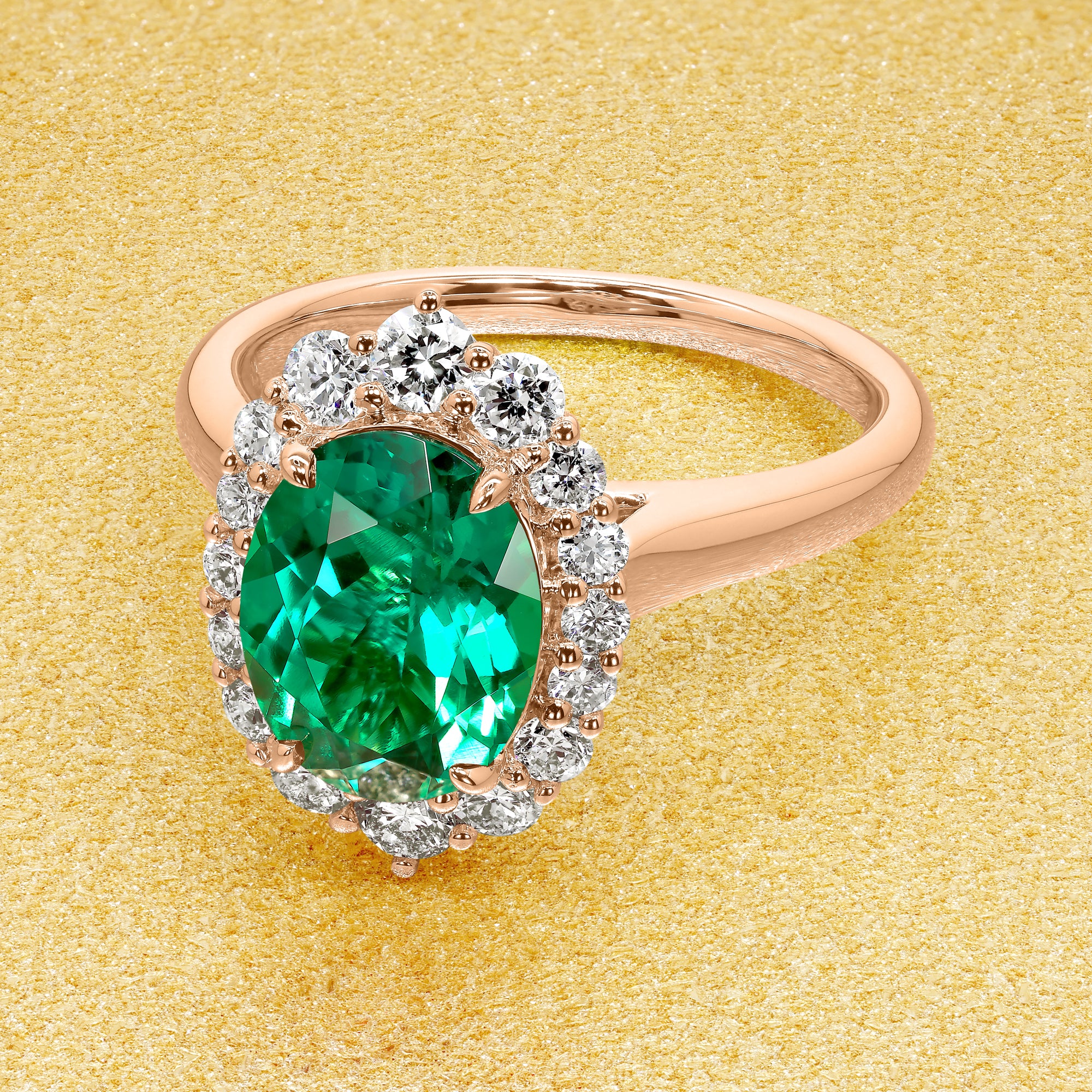 Gloria 1.5ct Elongated Lab-grown Oval-cut Green Emerald Halo Cathedral Engagement Ring in 14K Gold, 18K Gold, or Platinum by Earthena Jewelry of Beverly Hills.