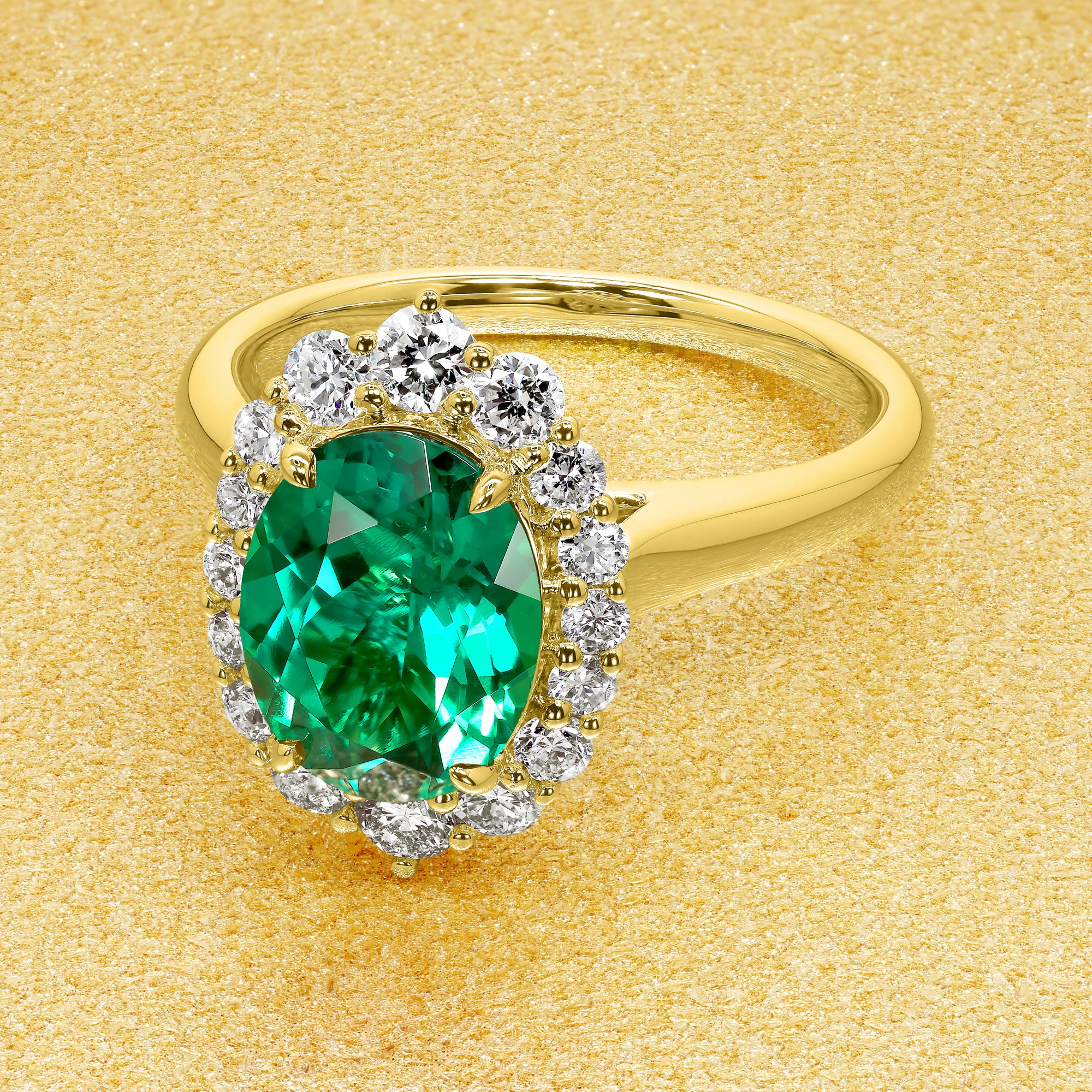 Gloria 1.5ct Elongated Lab-grown Oval-cut Green Emerald Halo Cathedral Engagement Ring in 14K Gold, 18K Gold, or Platinum by Earthena Jewelry of Beverly Hills.