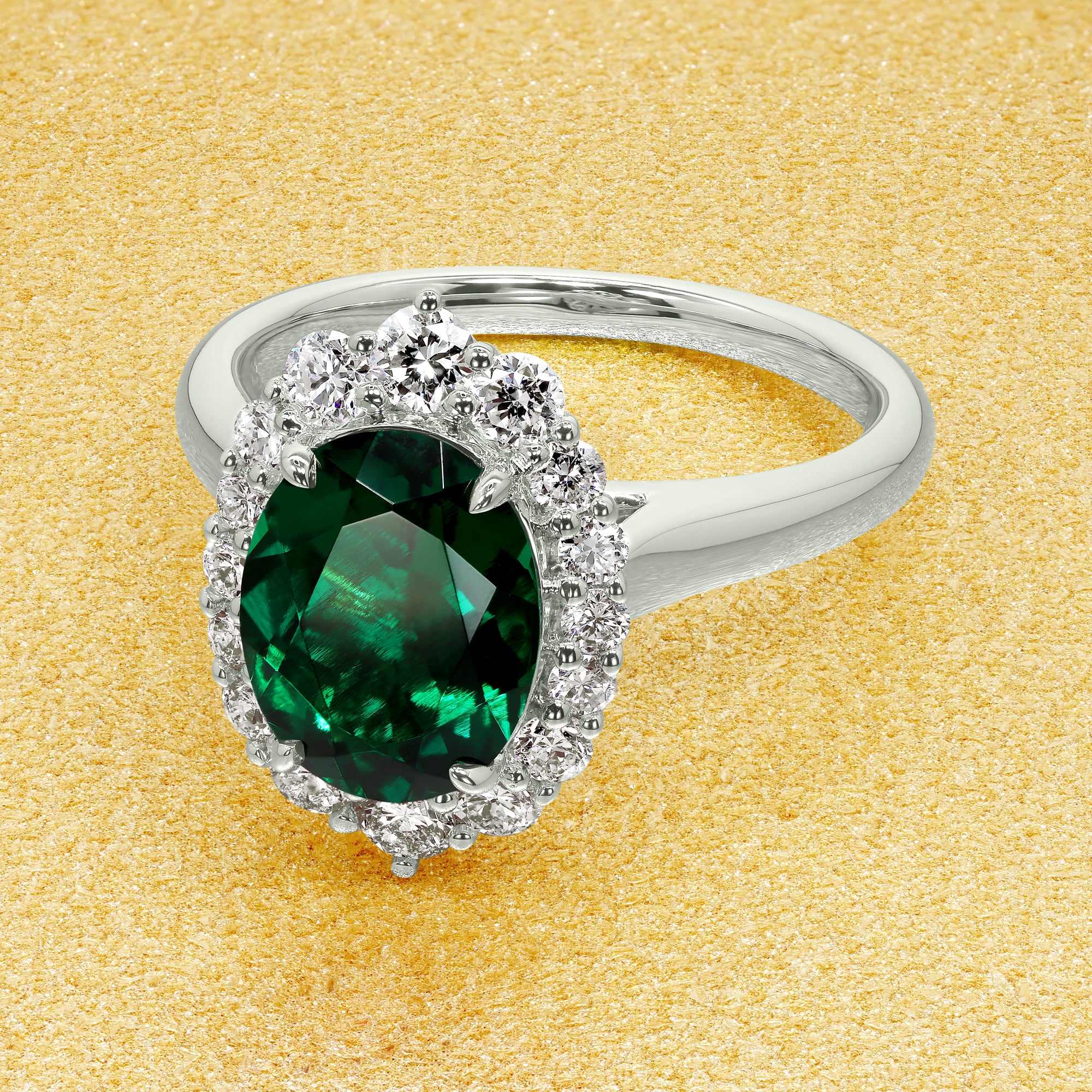 Gloria 1.5ct Elongated Lab-grown Oval-cut Green Emerald Halo Cathedral Engagement Ring in 14K Gold, 18K Gold, or Platinum by Earthena Jewelry of Beverly Hills.