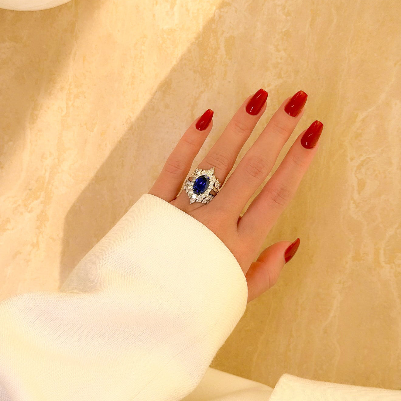 Gloria 4ct Oval Lab-Grown Royal Blue Sapphire with Dual Isabella V-Shaped Diamond Bands in 14K Gold, 18K Gold, or Platinum by Earthena Jewelry of Beverly Hills.