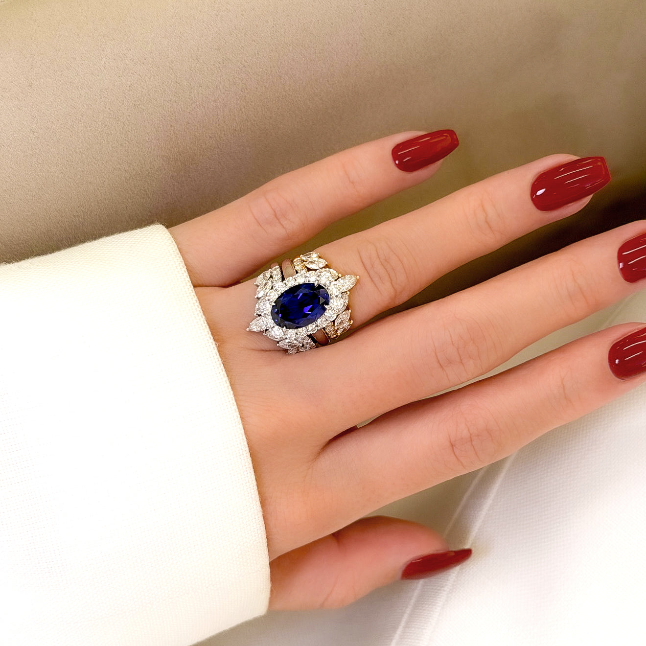 Gloria 4ct Oval Lab-Grown Royal Blue Sapphire with Dual Isabella V-Shaped Diamond Bands in 14K Gold, 18K Gold, or Platinum by Earthena Jewelry of Beverly Hills.