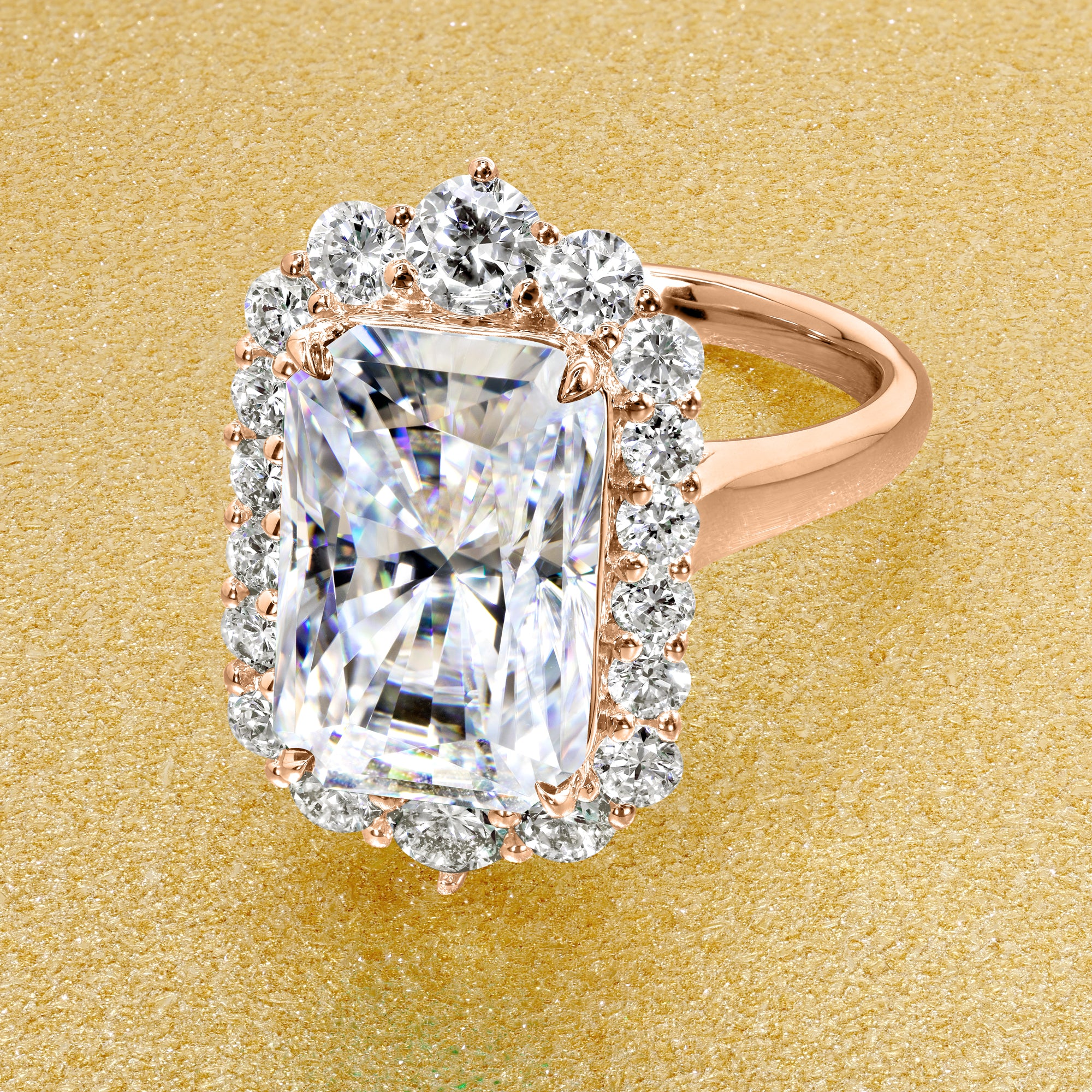 Gloria 4.5ct Elongated Radiant-cut Moissanite Halo Cathedral Engagement ring in 14K Gold, 18K Gold, or Platinum by Earthena Jewelry of Beverly Hills.