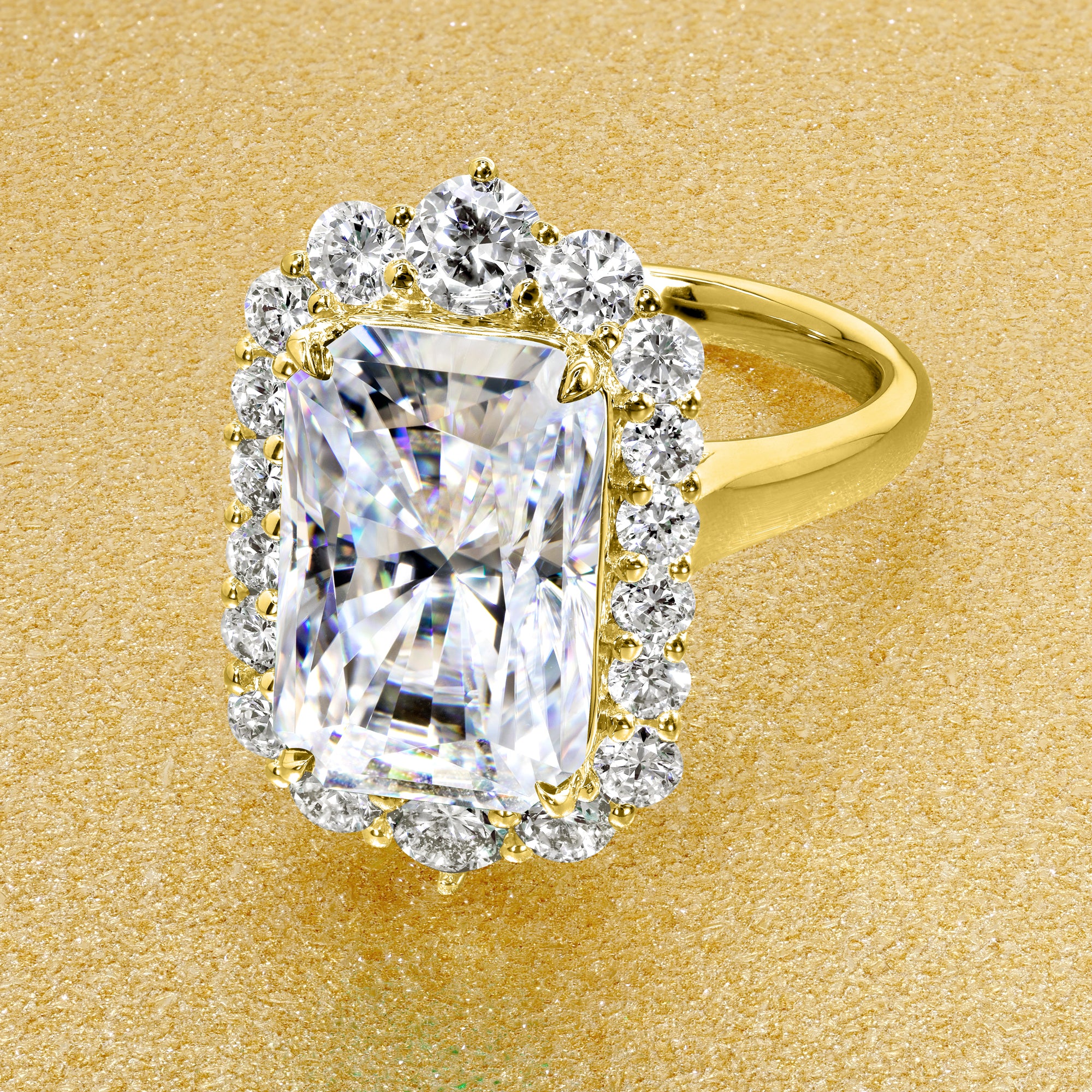 Gloria 4.5ct Elongated Radiant-cut Moissanite Halo Cathedral Engagement ring in 14K Gold, 18K Gold, or Platinum by Earthena Jewelry of Beverly Hills.