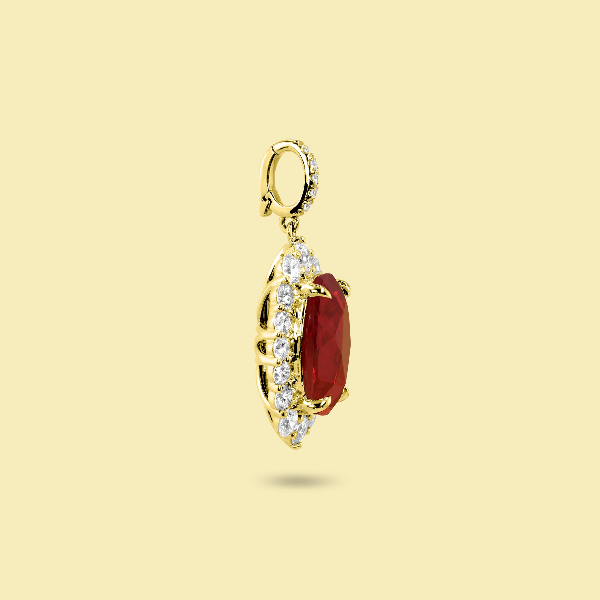 Gloria 4ct Elongated Lab-Grown Oval-Cut Ruby Halo Charm Pendant in 14K Gold, 18K Gold, or Platinum by Earthena Jewelry of Beverly Hills.