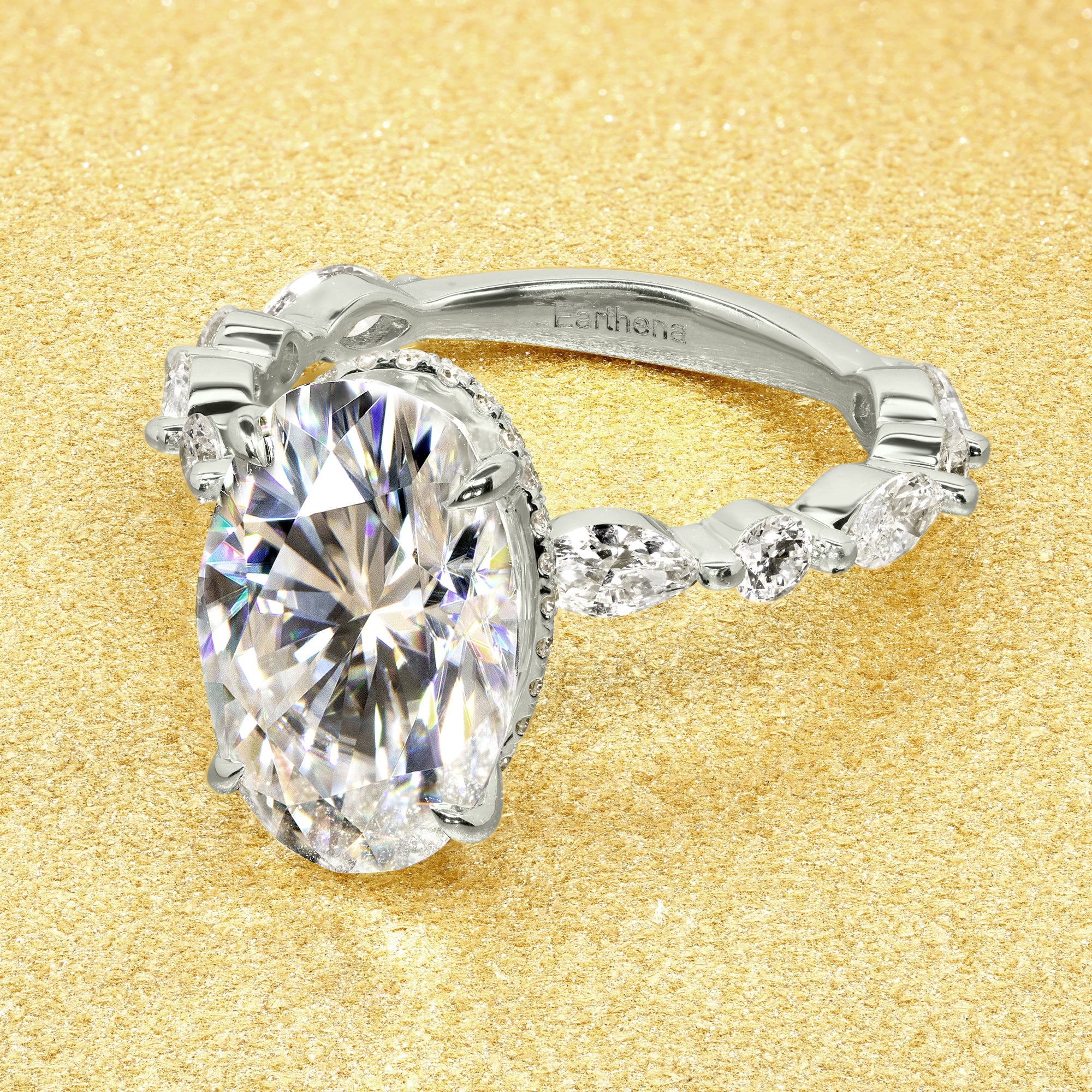 Classic Grace 4.75ct Oval Brilliant-cut Moissanite Hidden Halo Floating Marquise and Round Lab-grown Diamond Engagement ring in 14K gold, 18K gold, or Platinum handcrafted in Los Angeles by Earthena Jewelry.